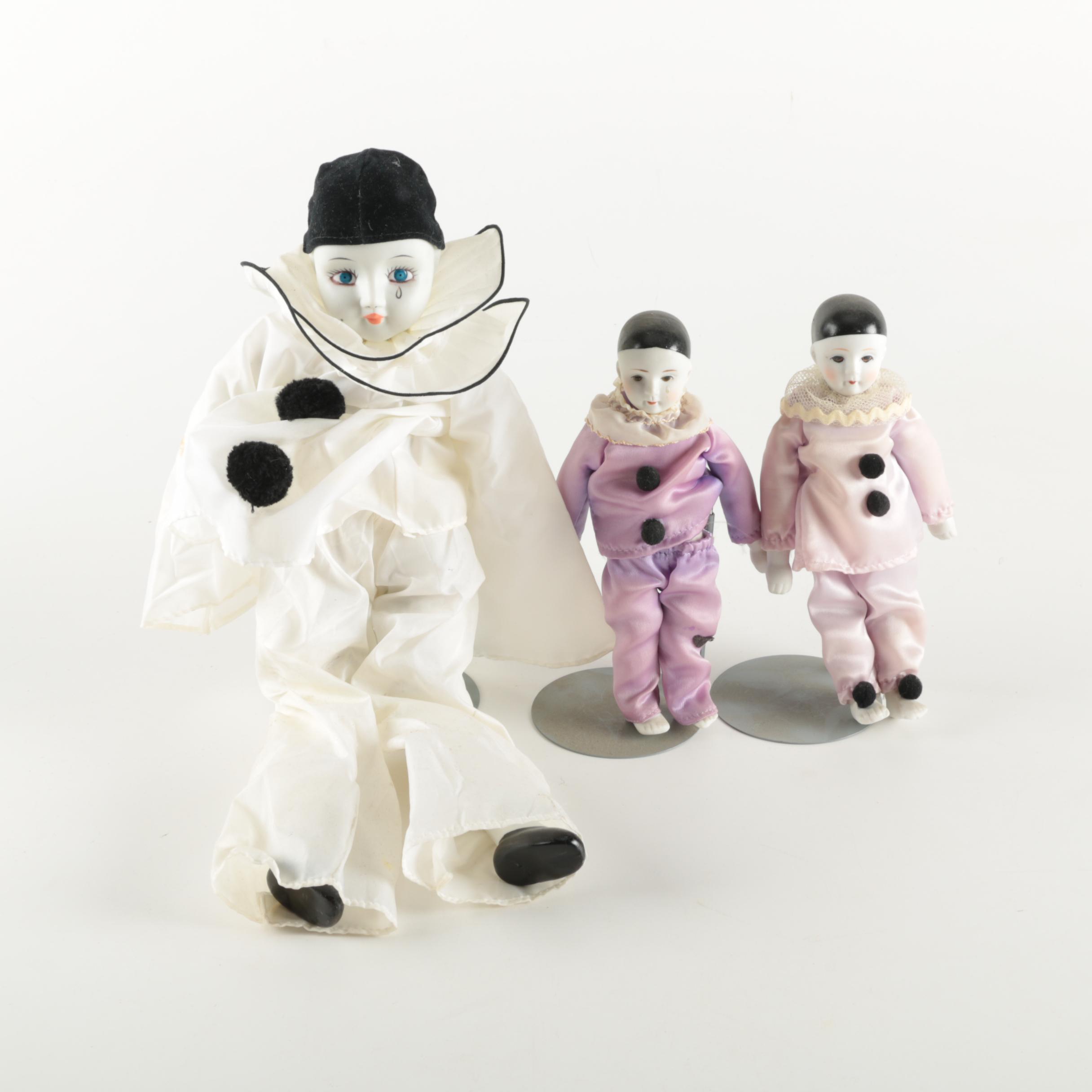 Three Porcelain Clown Dolls