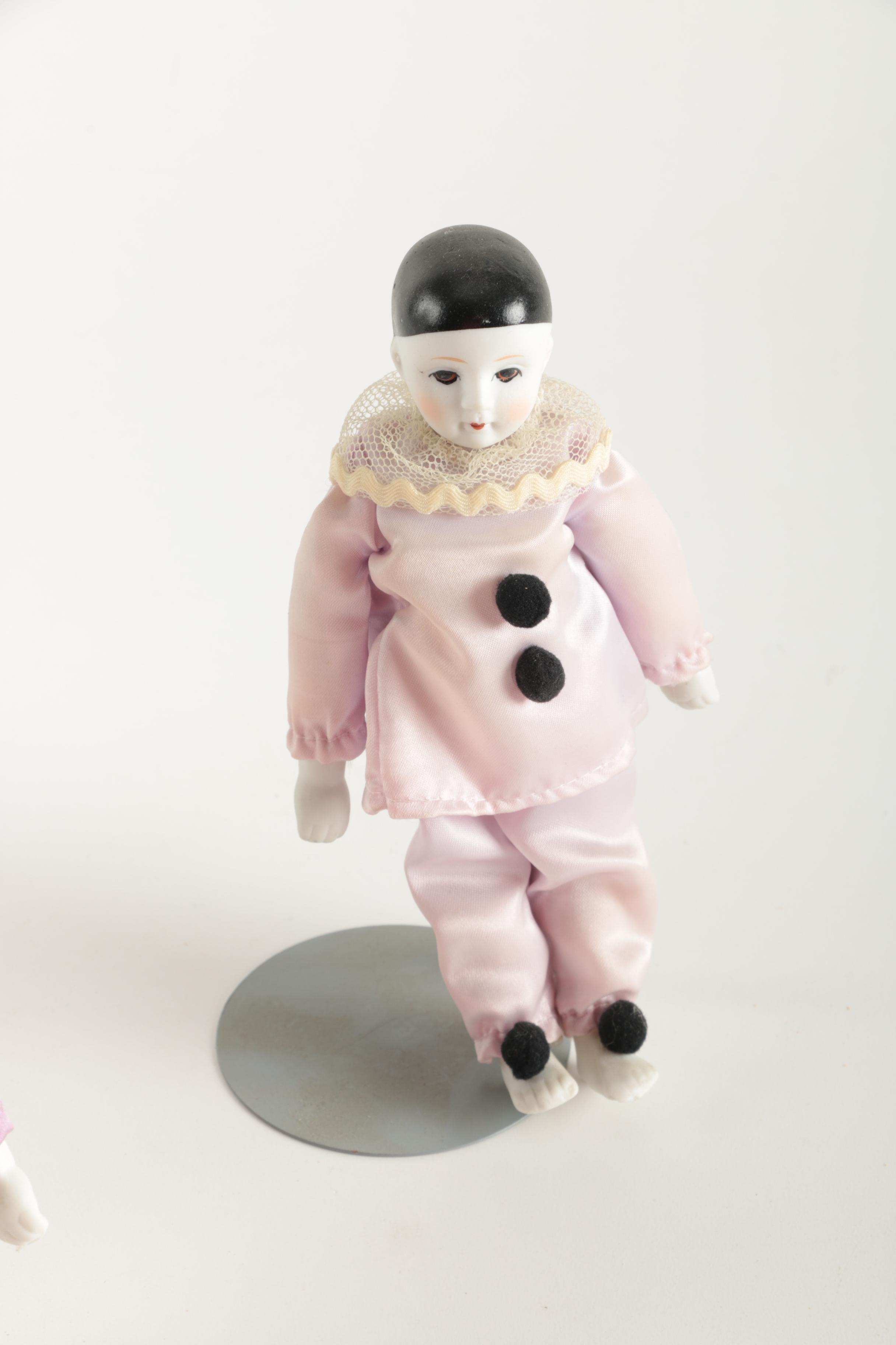 Three Porcelain Clown Dolls