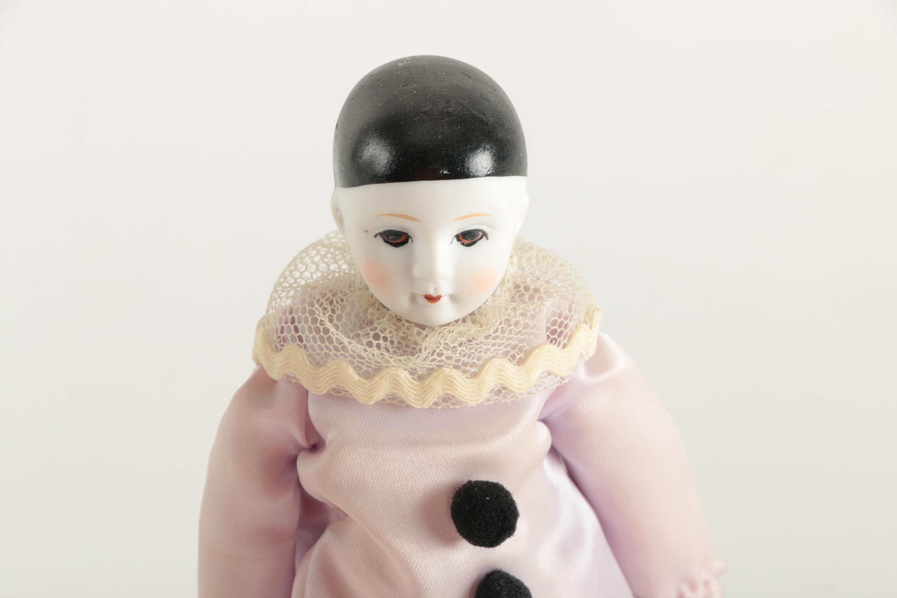 Three Porcelain Clown Dolls