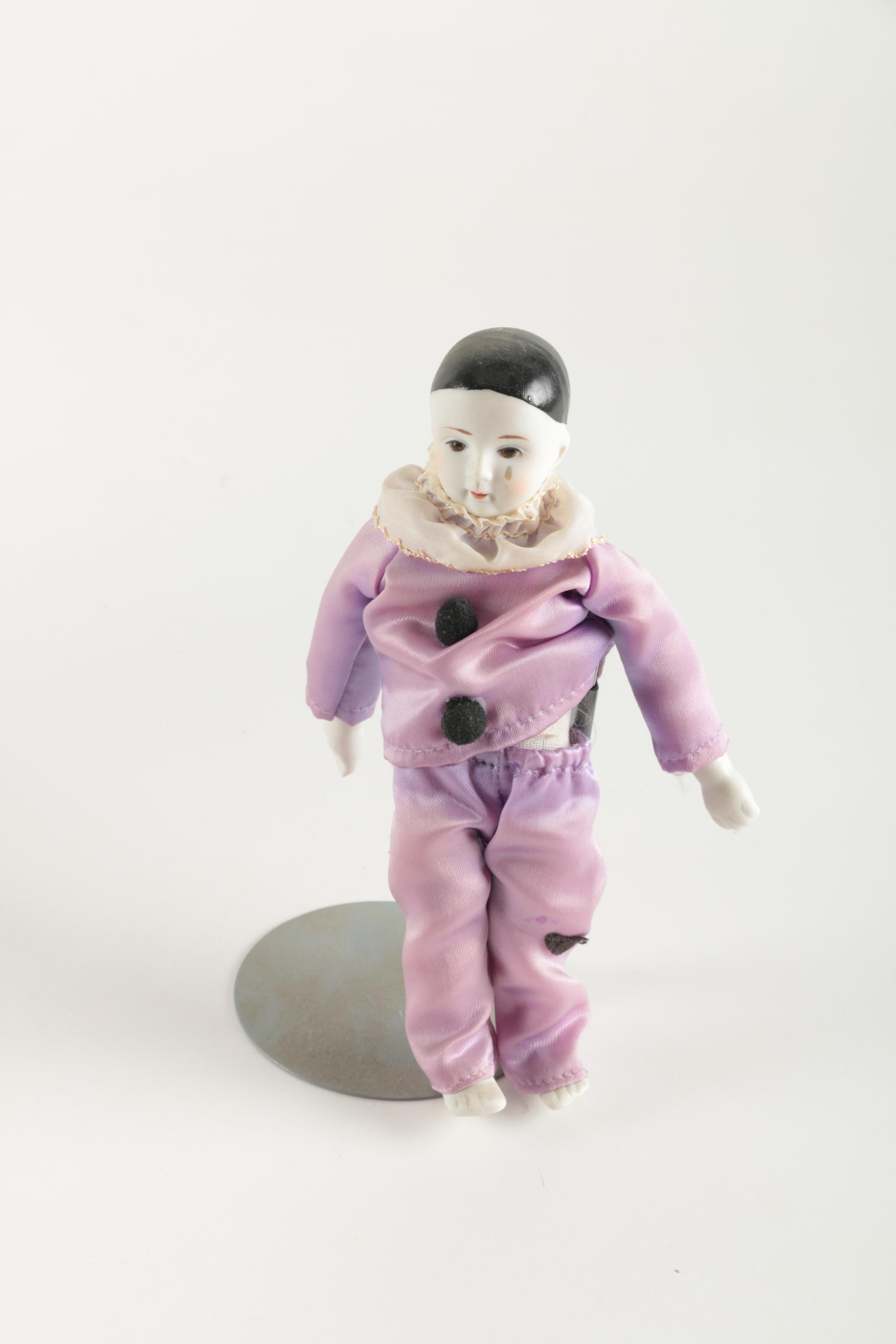 Three Porcelain Clown Dolls