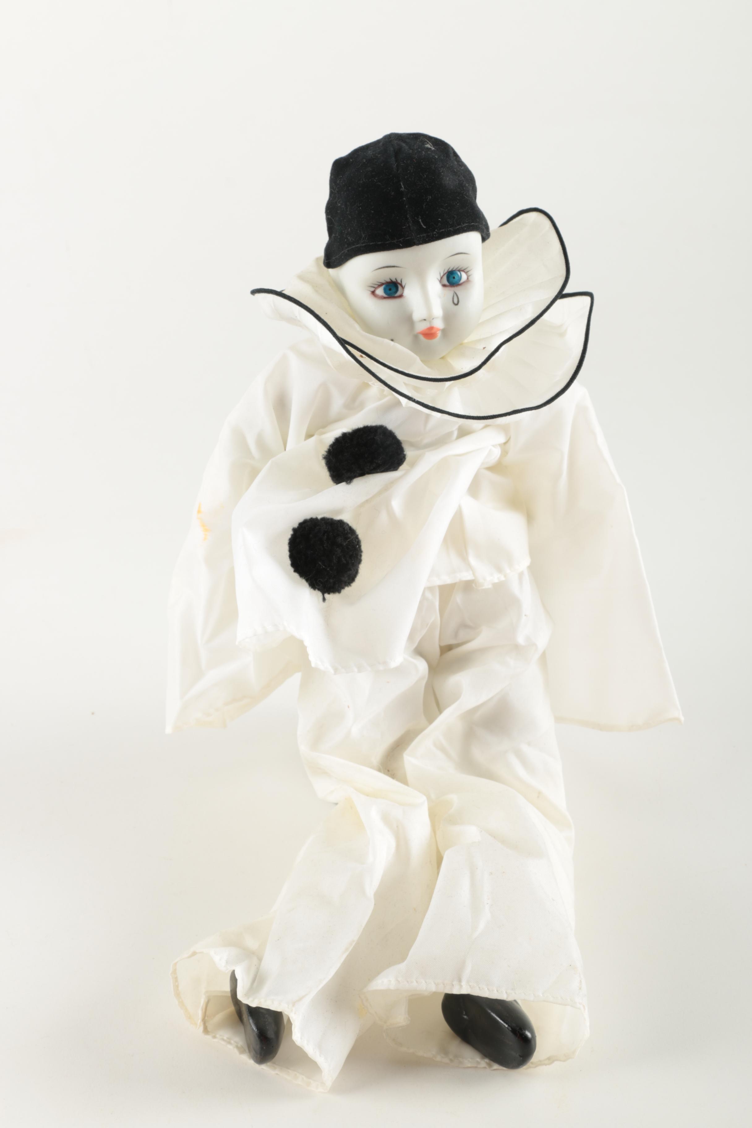 Three Porcelain Clown Dolls