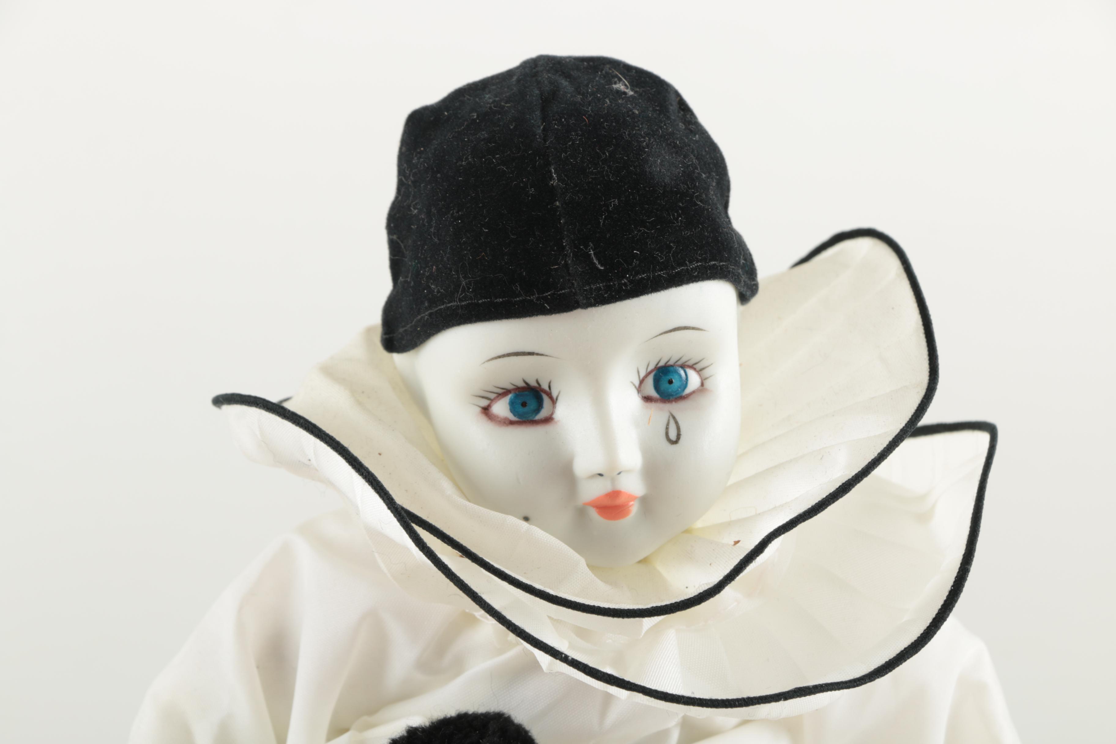 Three Porcelain Clown Dolls