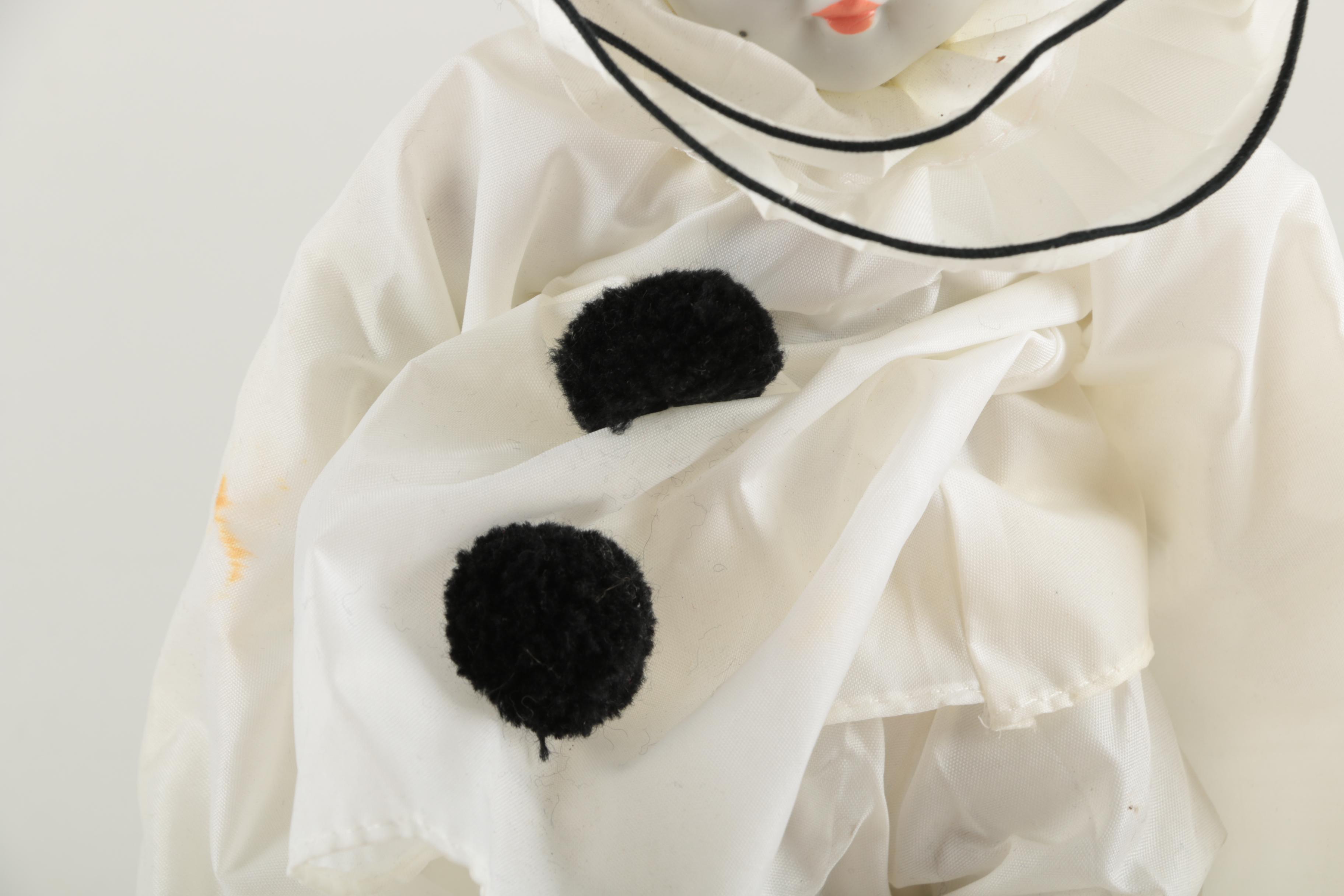 Three Porcelain Clown Dolls