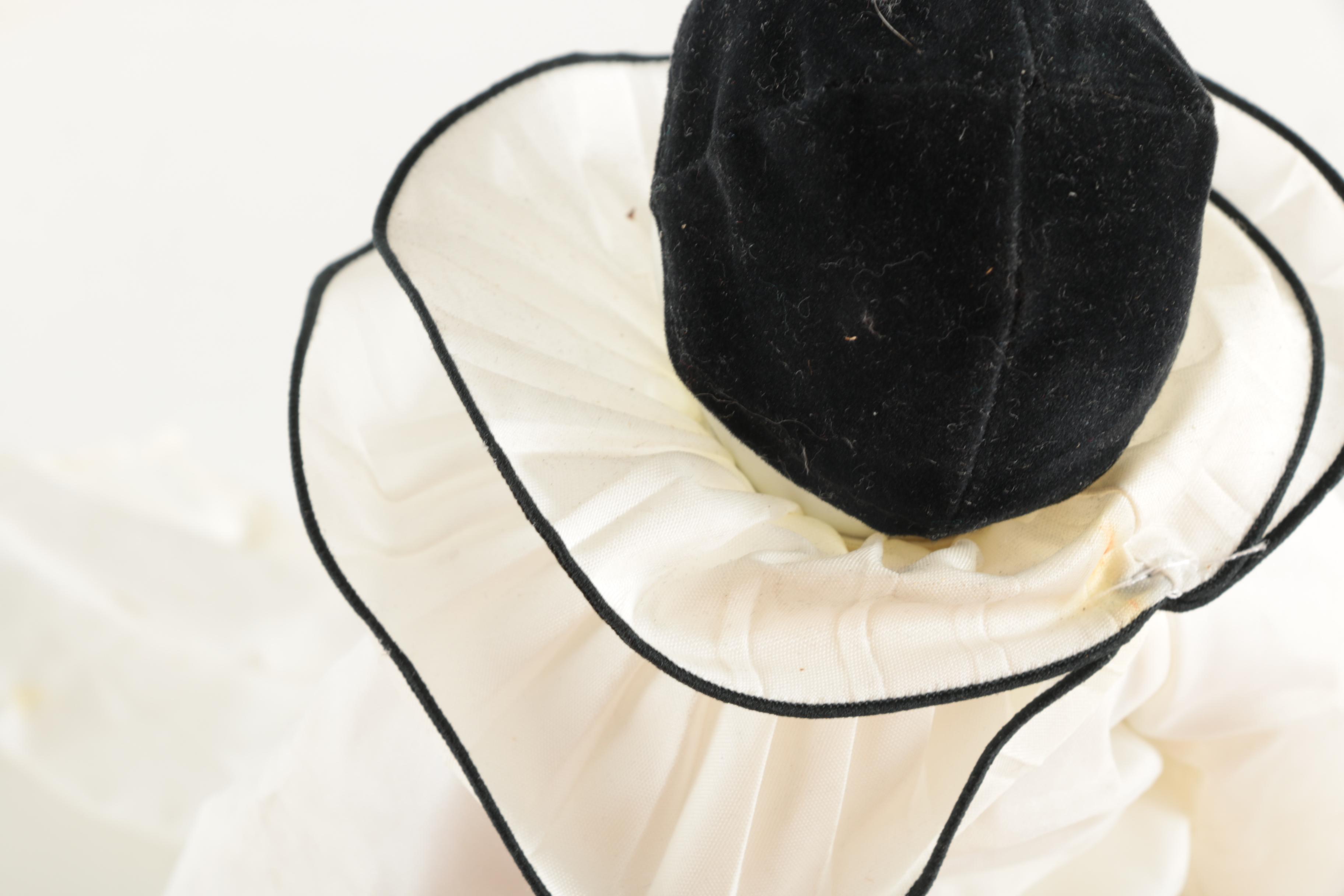 Three Porcelain Clown Dolls