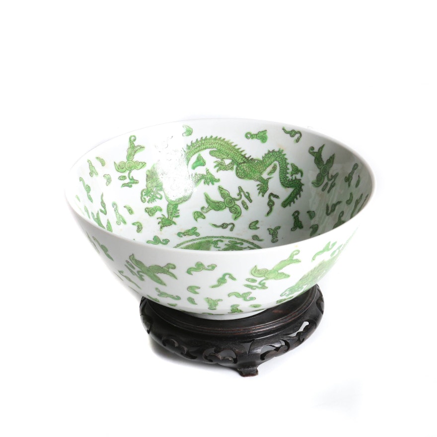 Chinese Green and White Porcelain Bowl with a Dragon Motif and a Wooden Stand