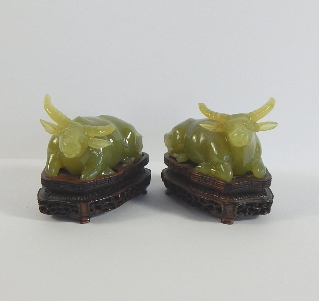 Two Vintage Jadeite Bull Figurines on Lotus Base