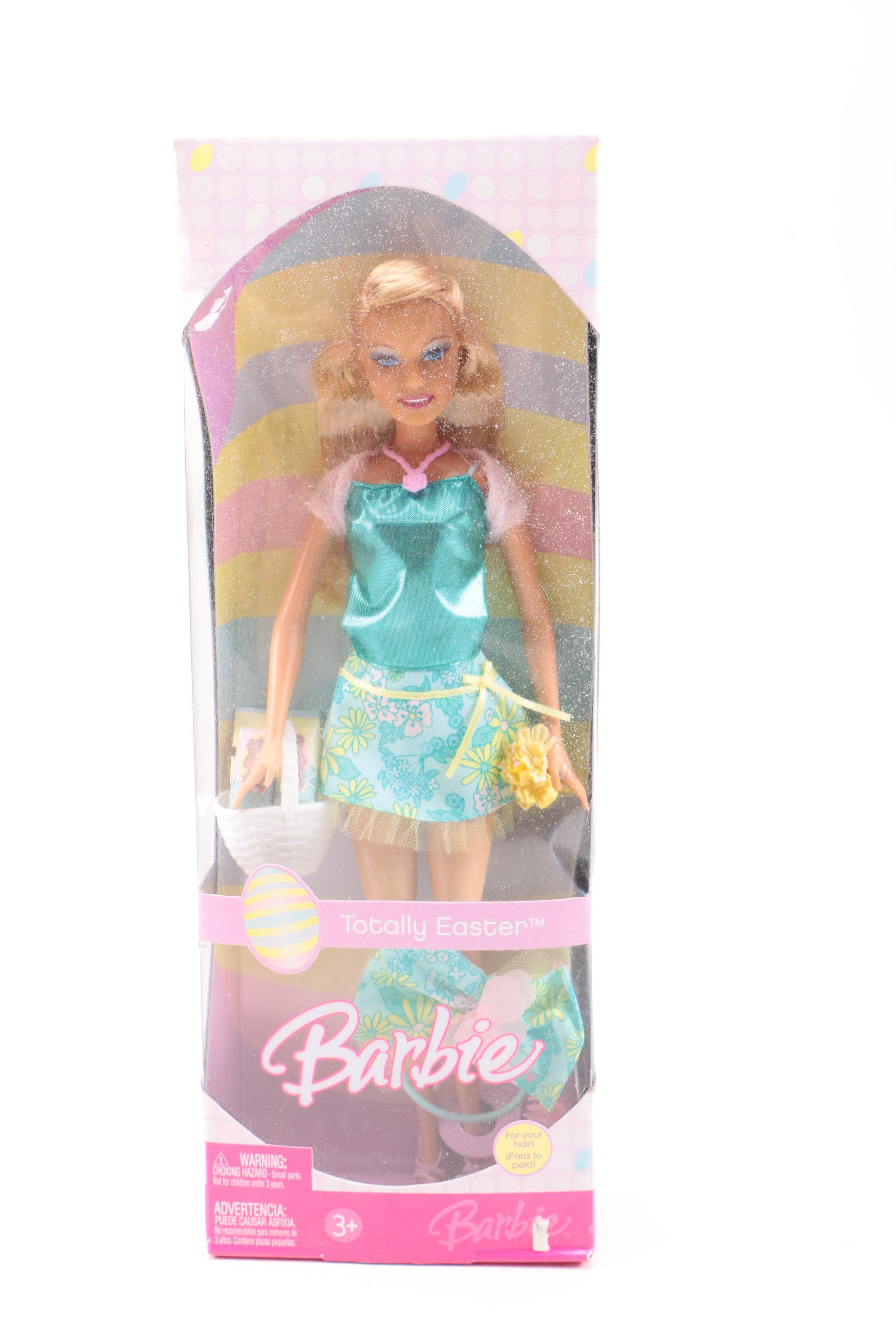 Assortment of Holiday Themed Barbie Dolls