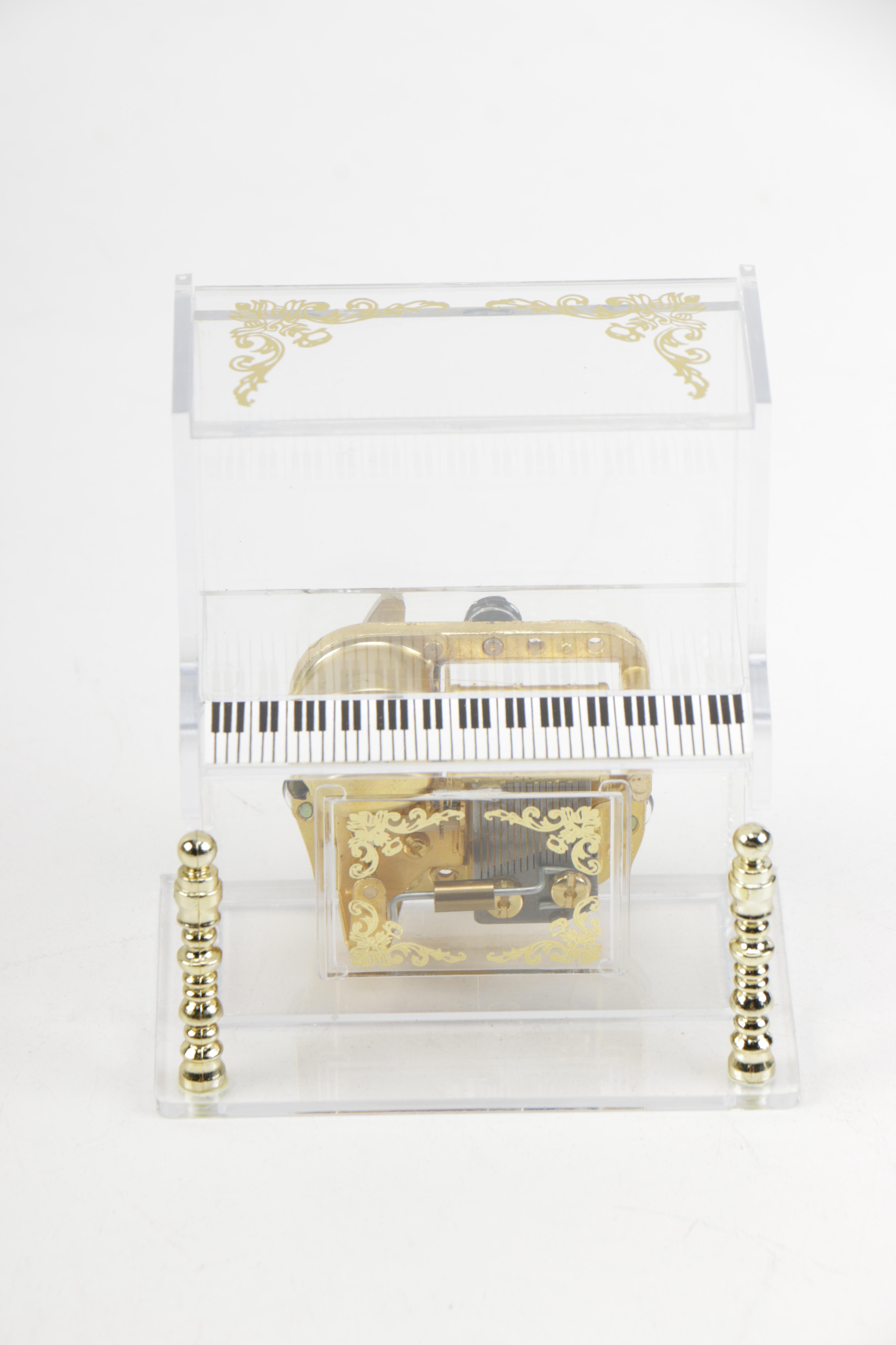 Ceramic and Plastic Music Boxes