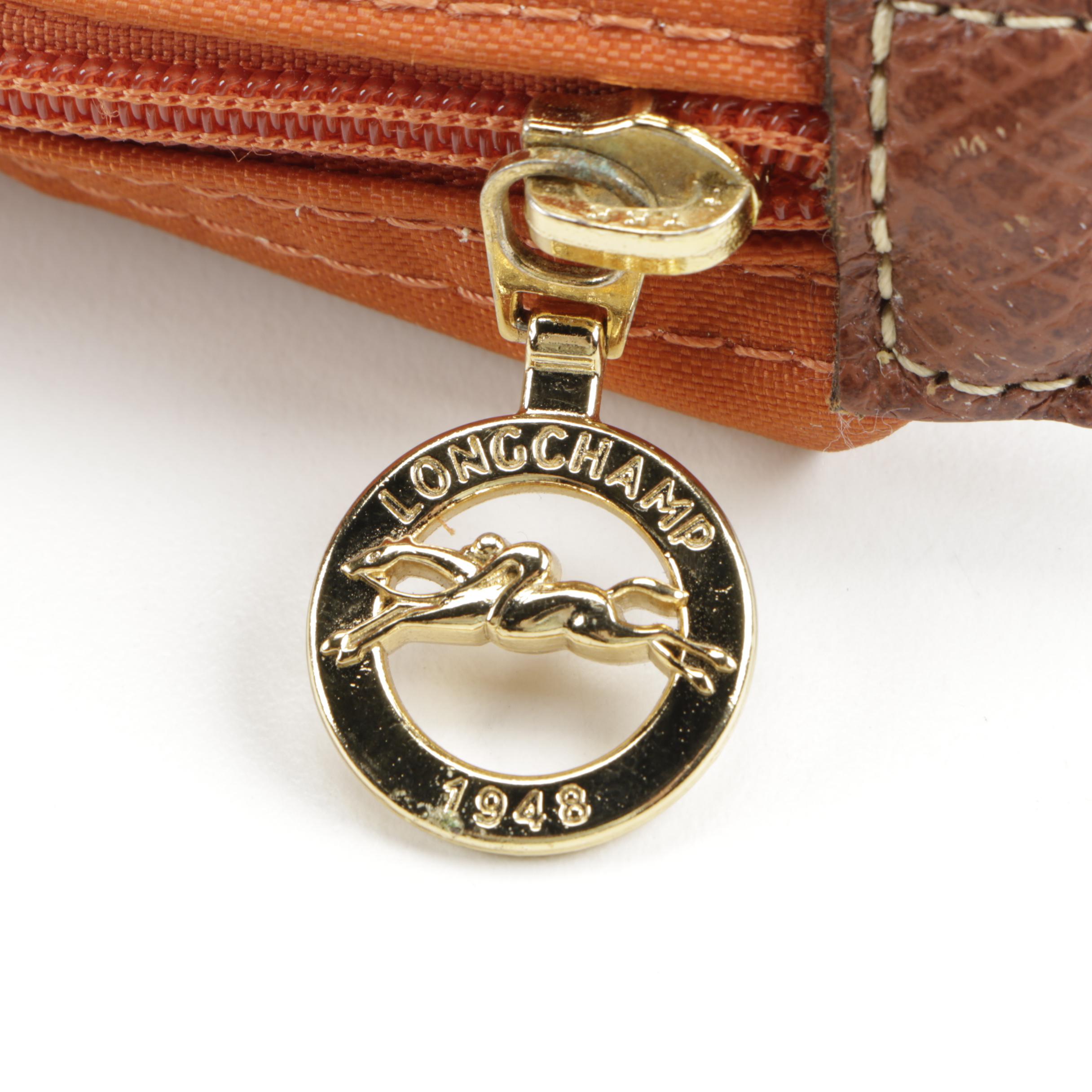 Orange Longchamp Tote and Kate Spade Wristlet