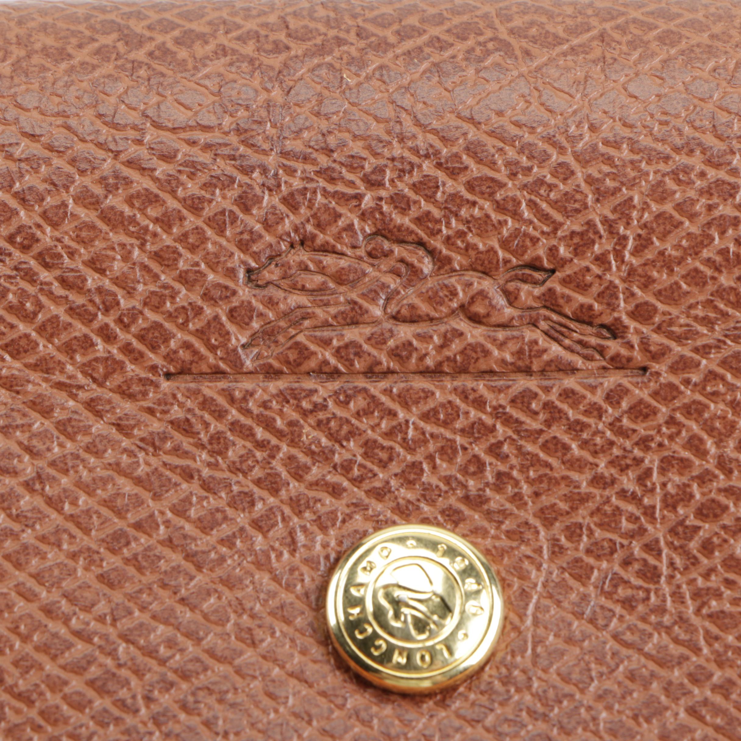 Orange Longchamp Tote and Kate Spade Wristlet