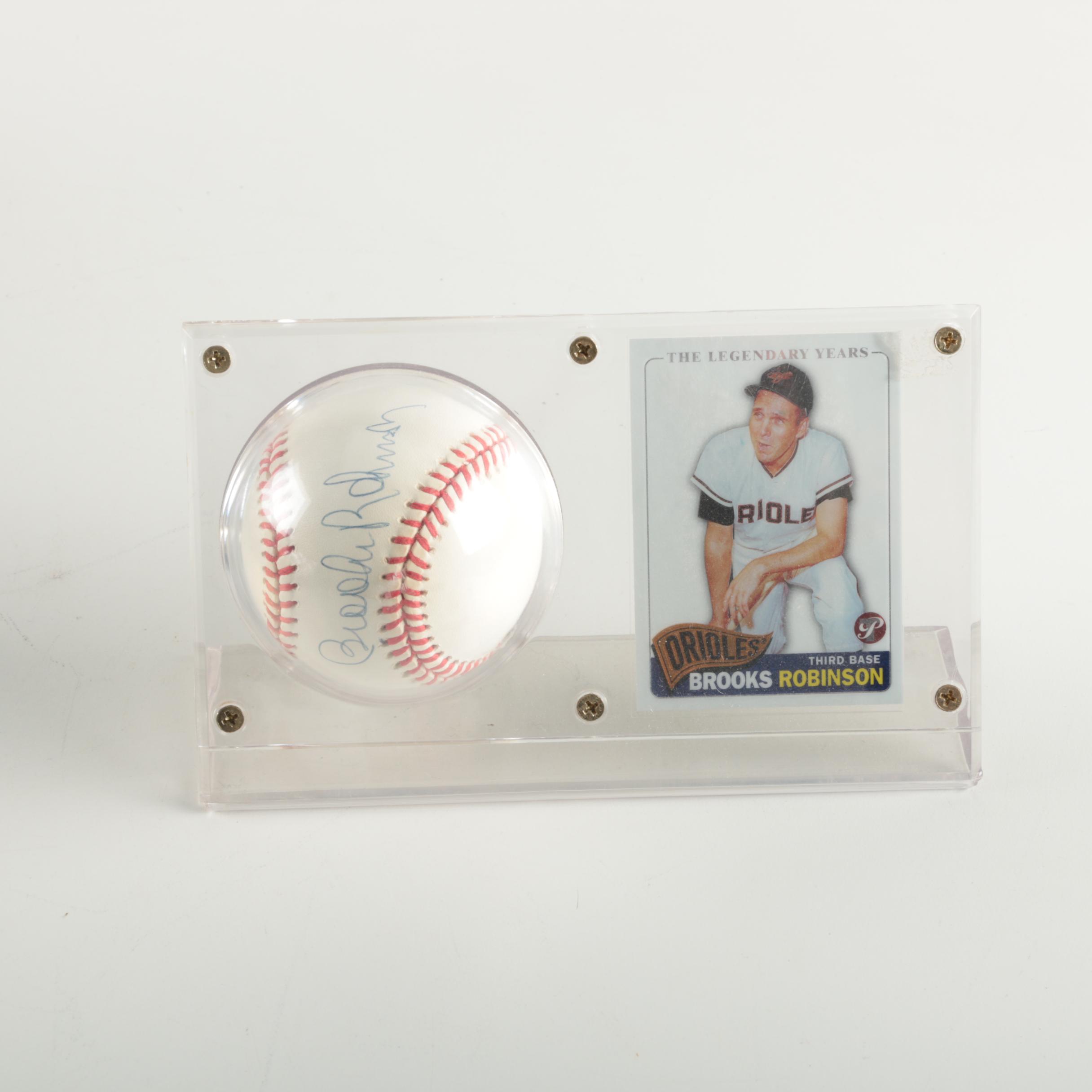 Brooks Robinson Signed Baseball with Topps Baseball Card