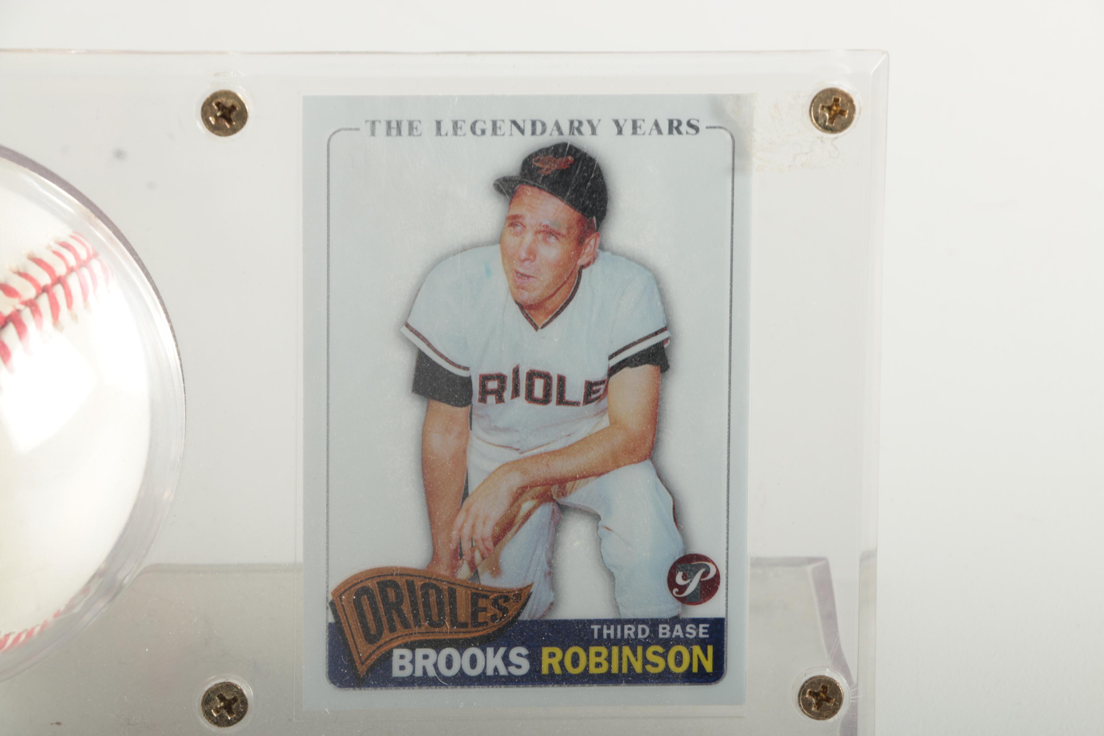 Brooks Robinson Signed Baseball with Topps Baseball Card