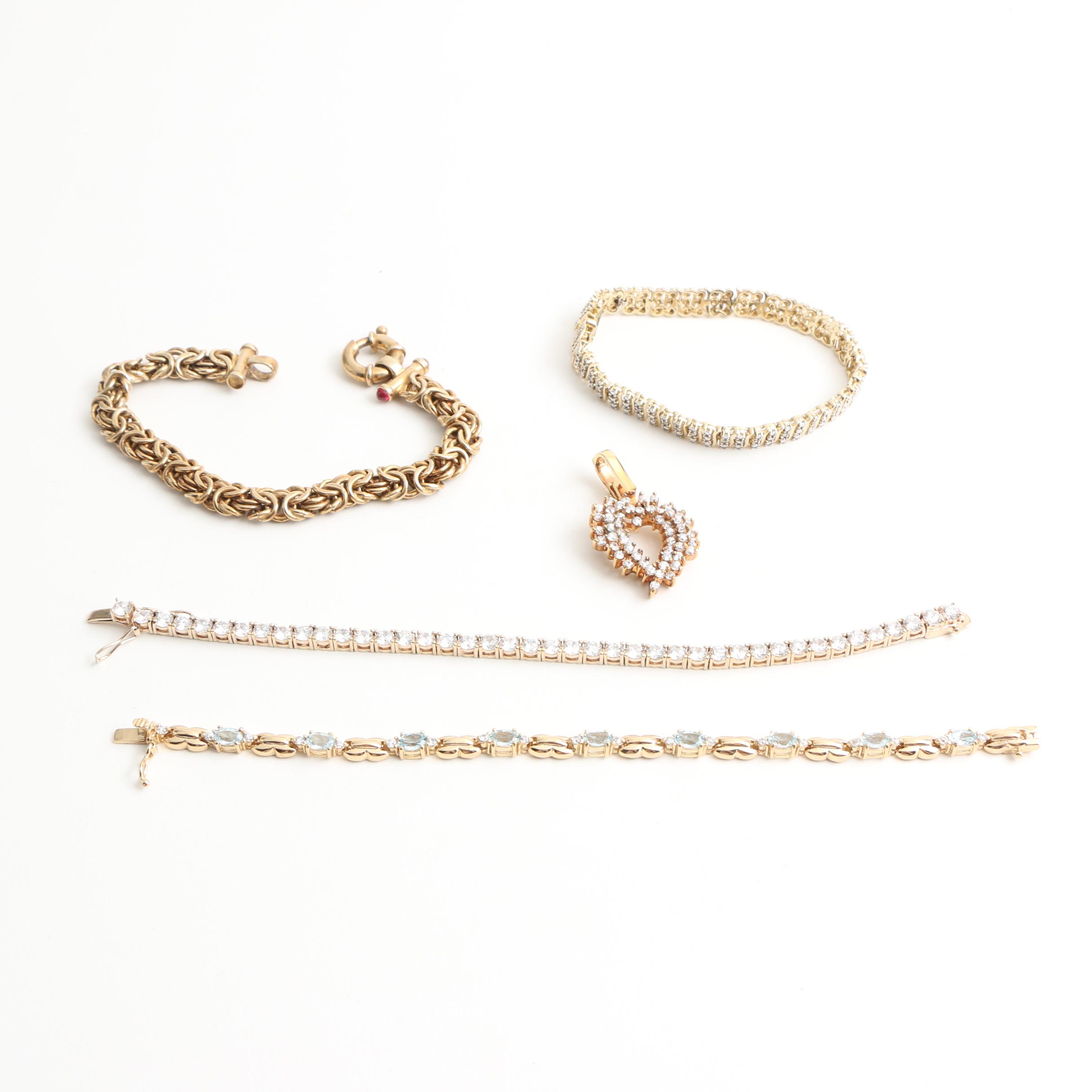 Assortment of Gold Toned Sterling Jewelry with Gemstones