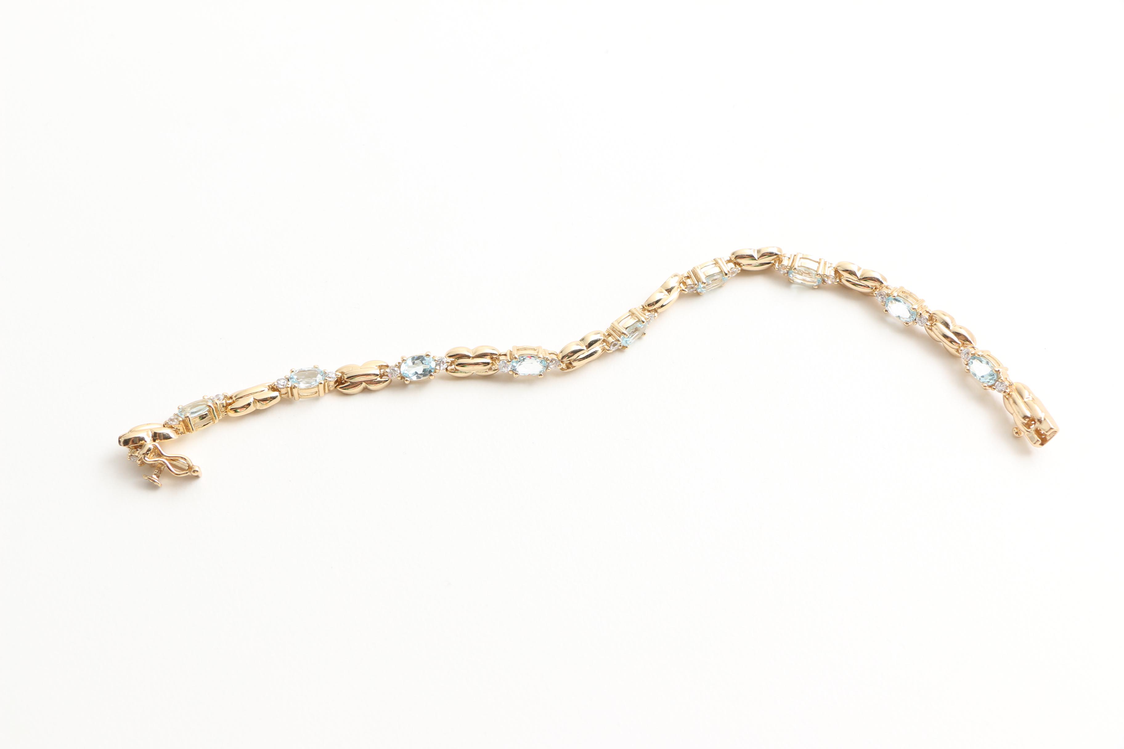 Assortment of Gold Toned Sterling Jewelry with Gemstones