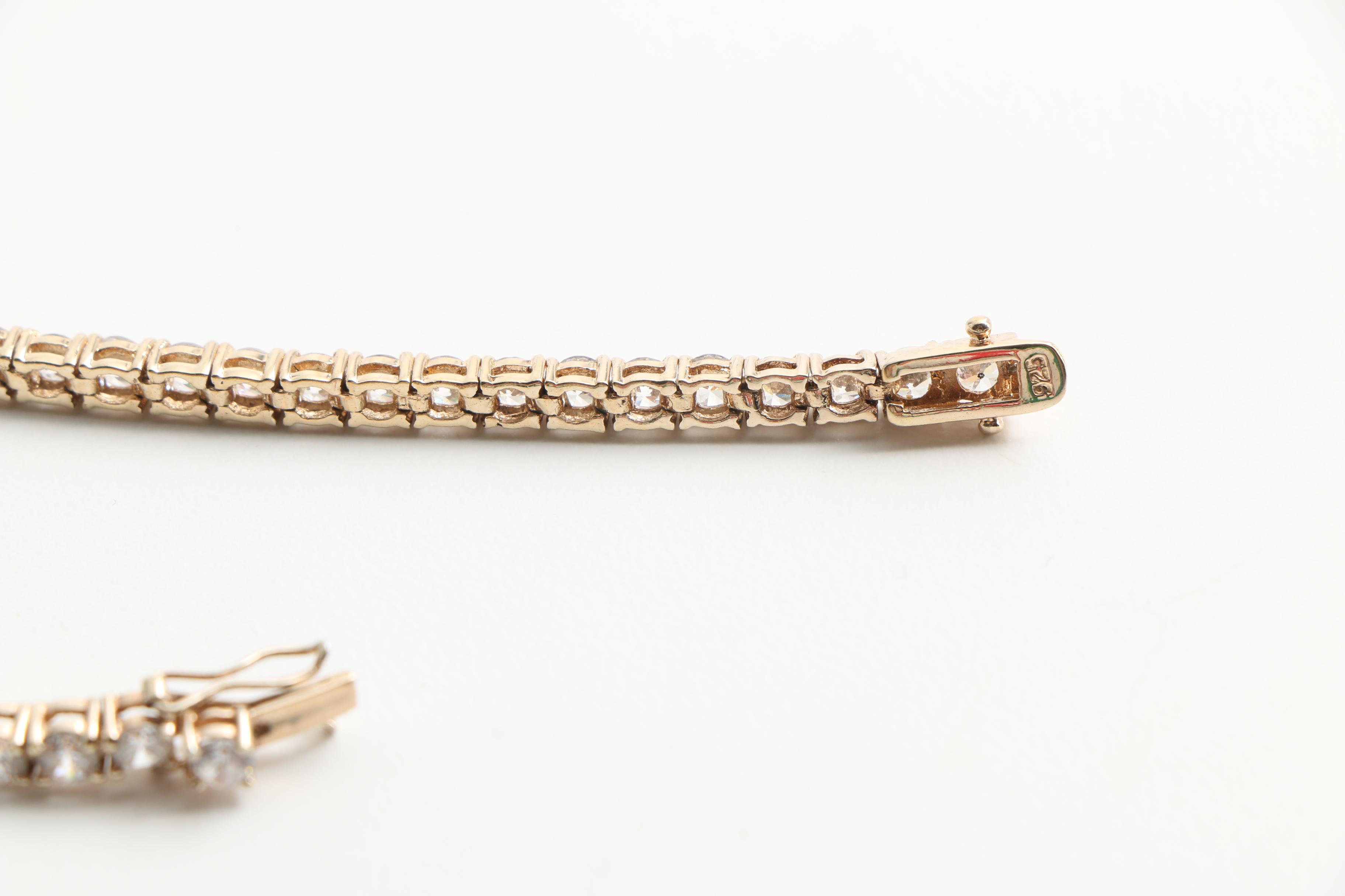 Assortment of Gold Toned Sterling Jewelry with Gemstones