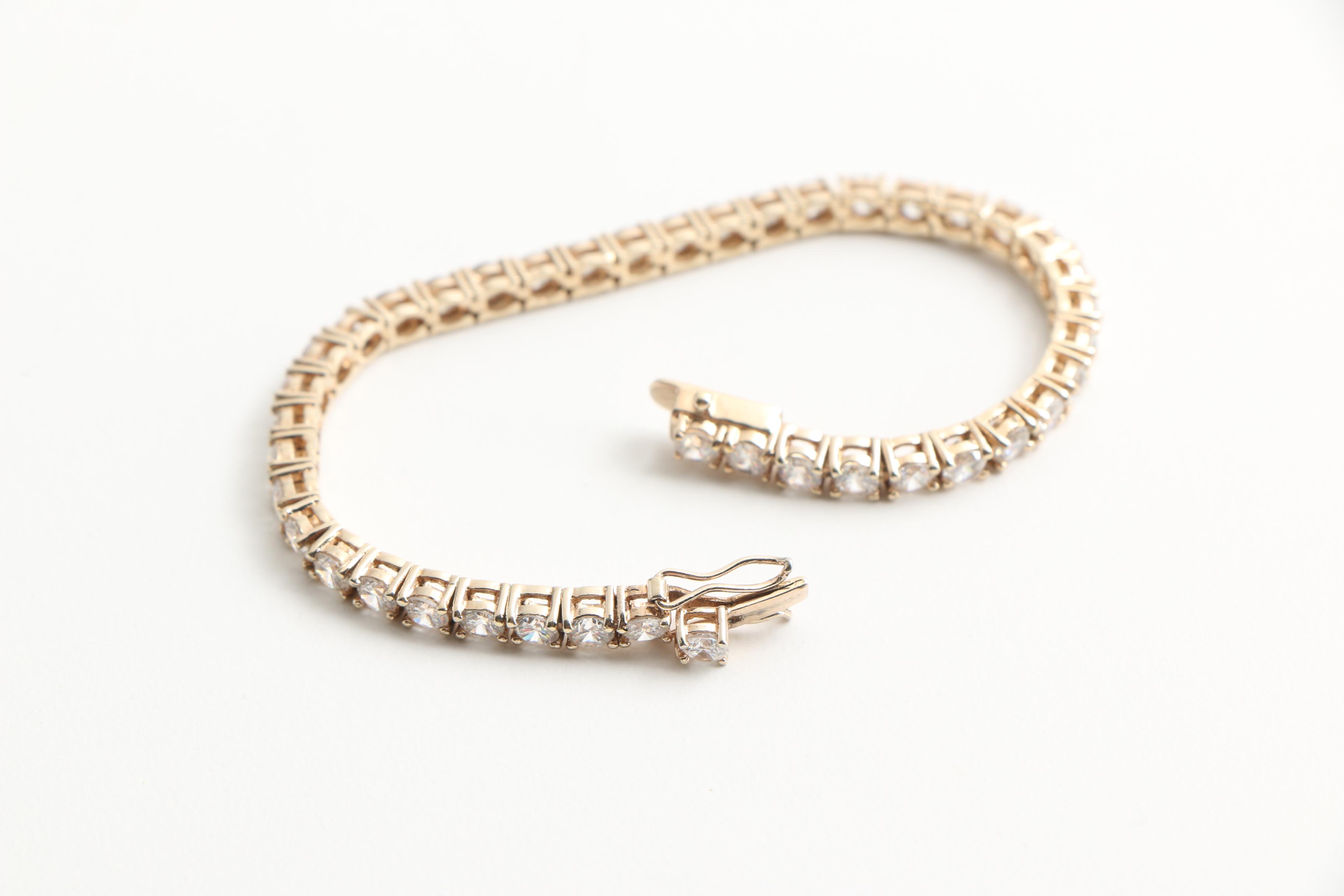 Assortment of Gold Toned Sterling Jewelry with Gemstones