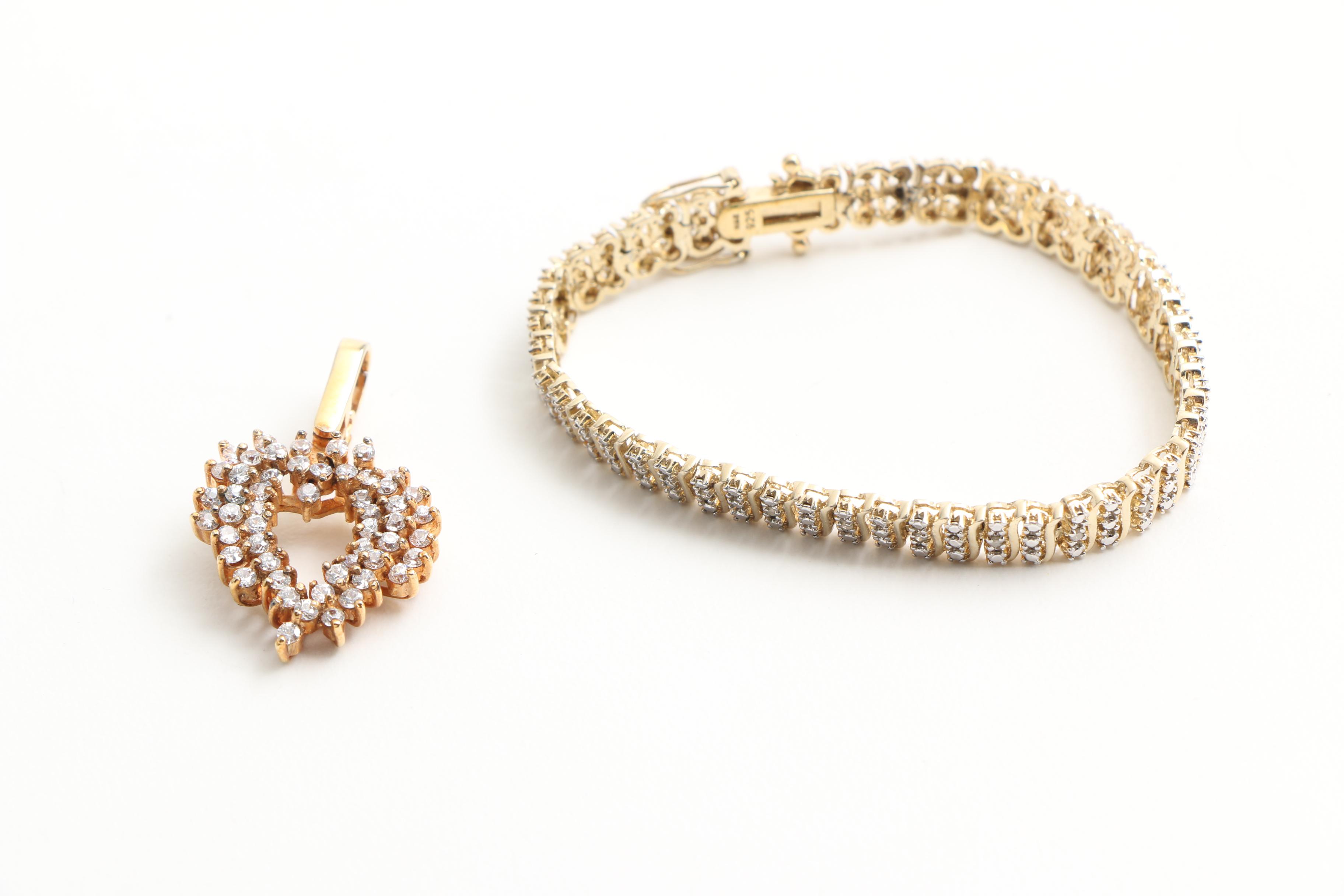 Assortment of Gold Toned Sterling Jewelry with Gemstones