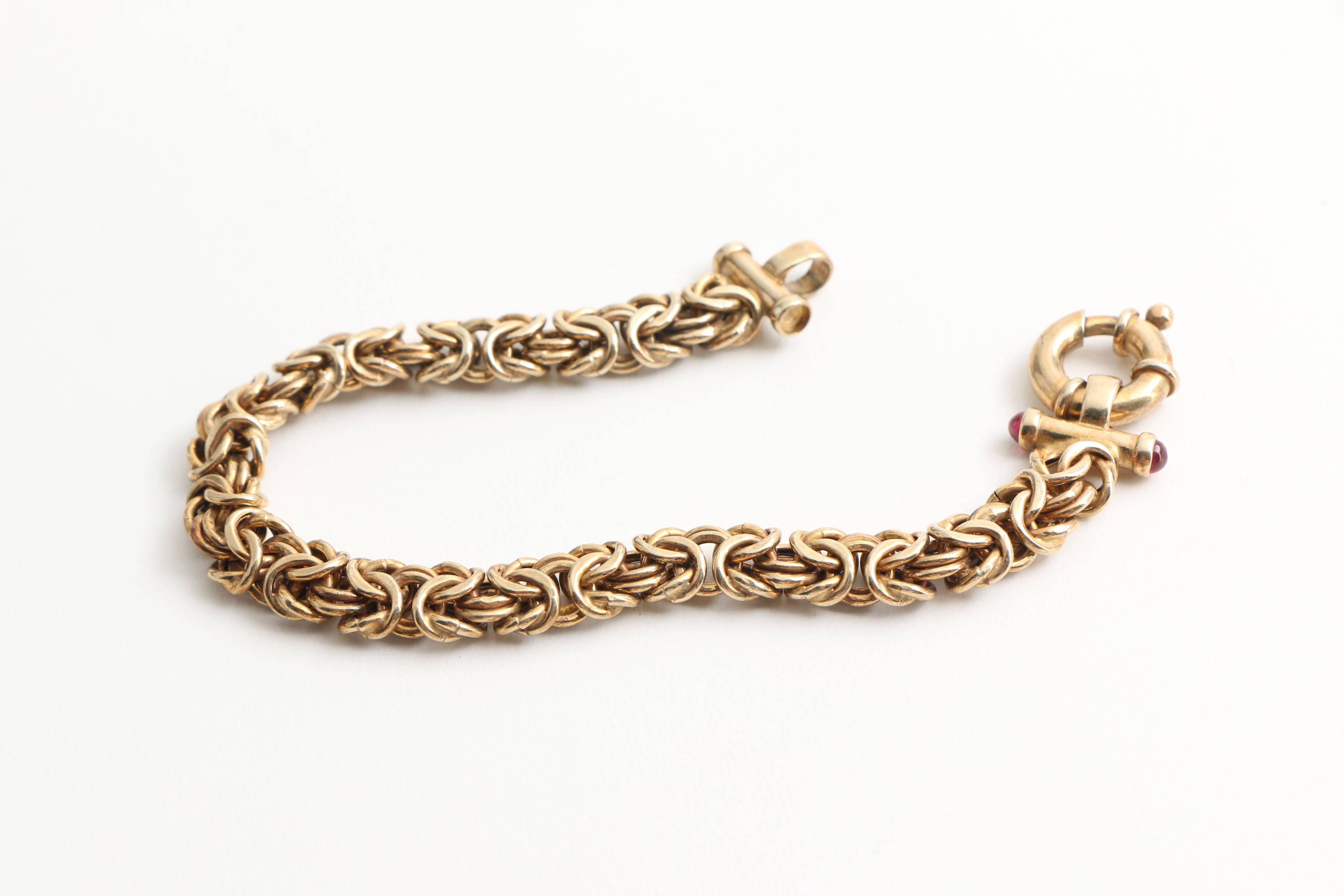 Assortment of Gold Toned Sterling Jewelry with Gemstones