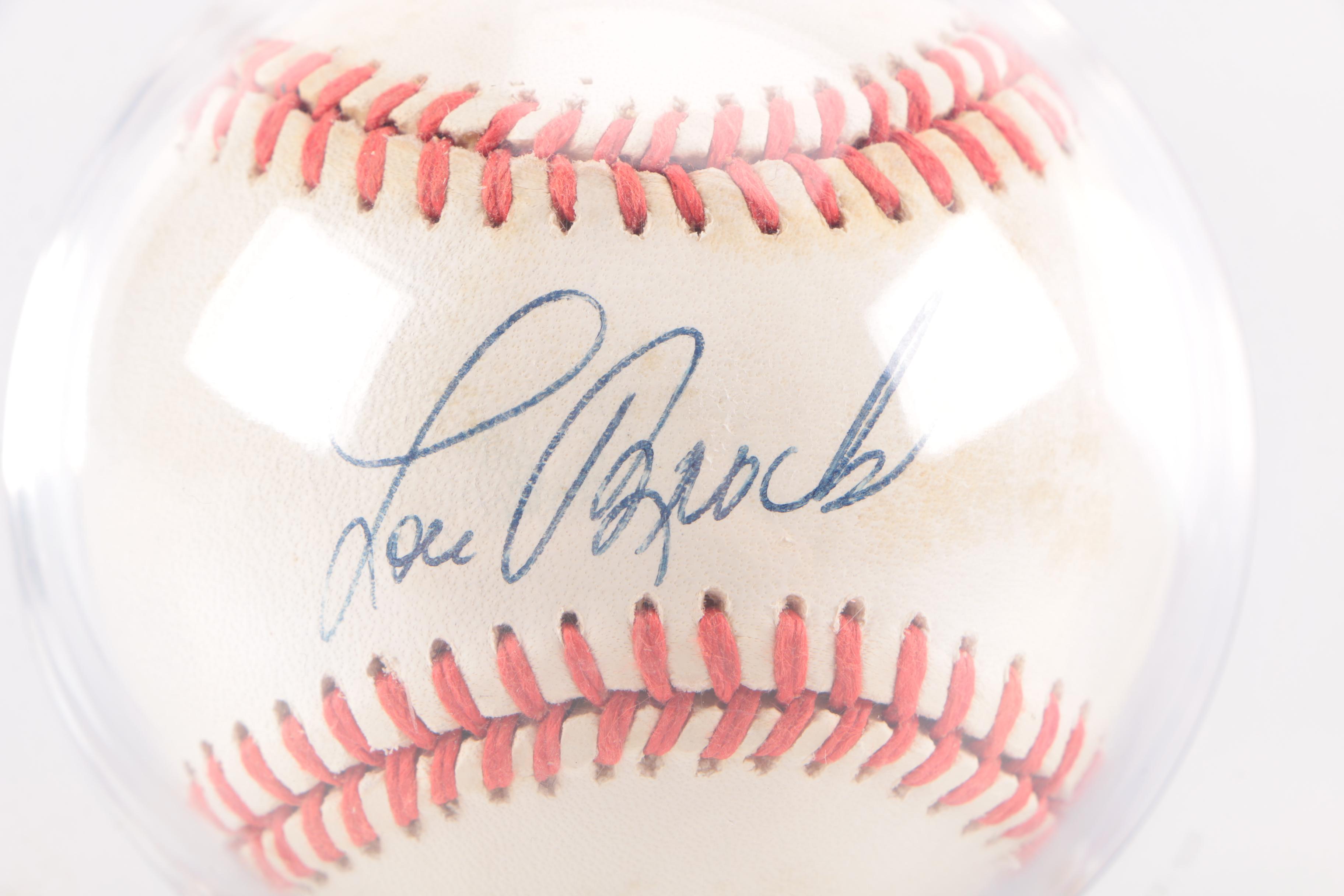 Lou Brock Signed Baseball with Topps Card