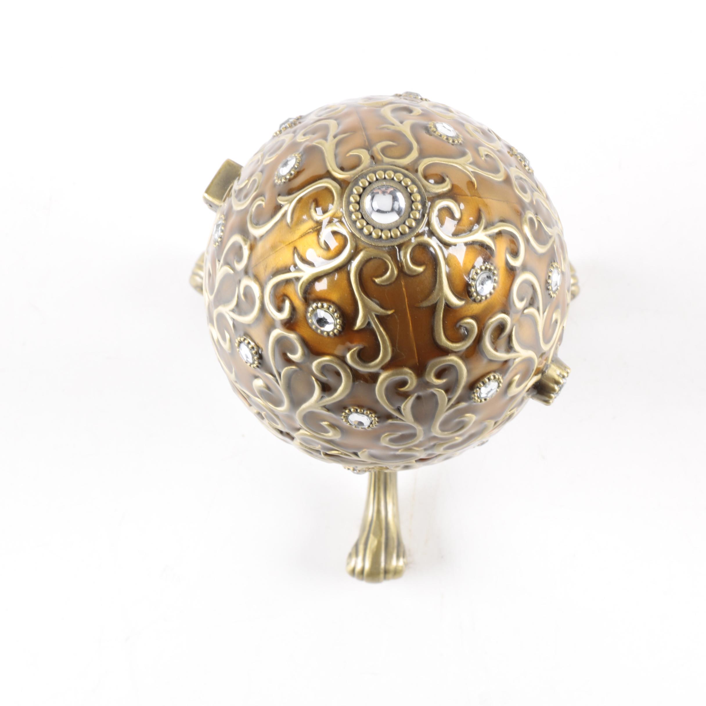 Ovoid Enameled Metal Music Box