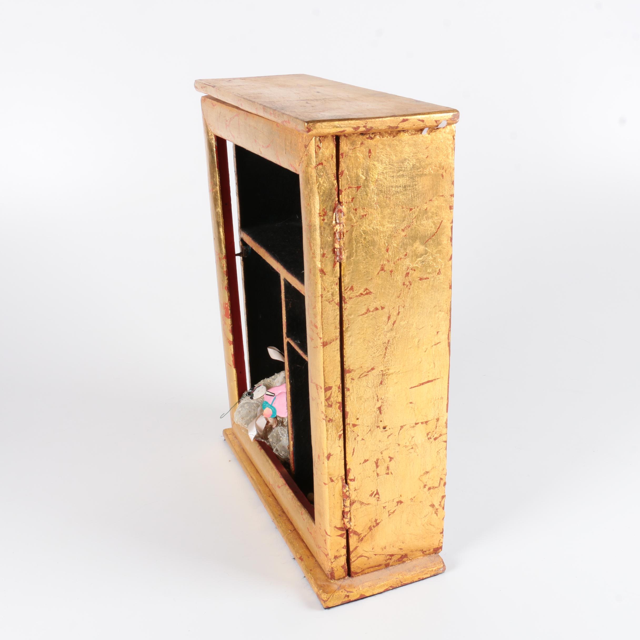 Variety of Dolls and Wooden Cabinet