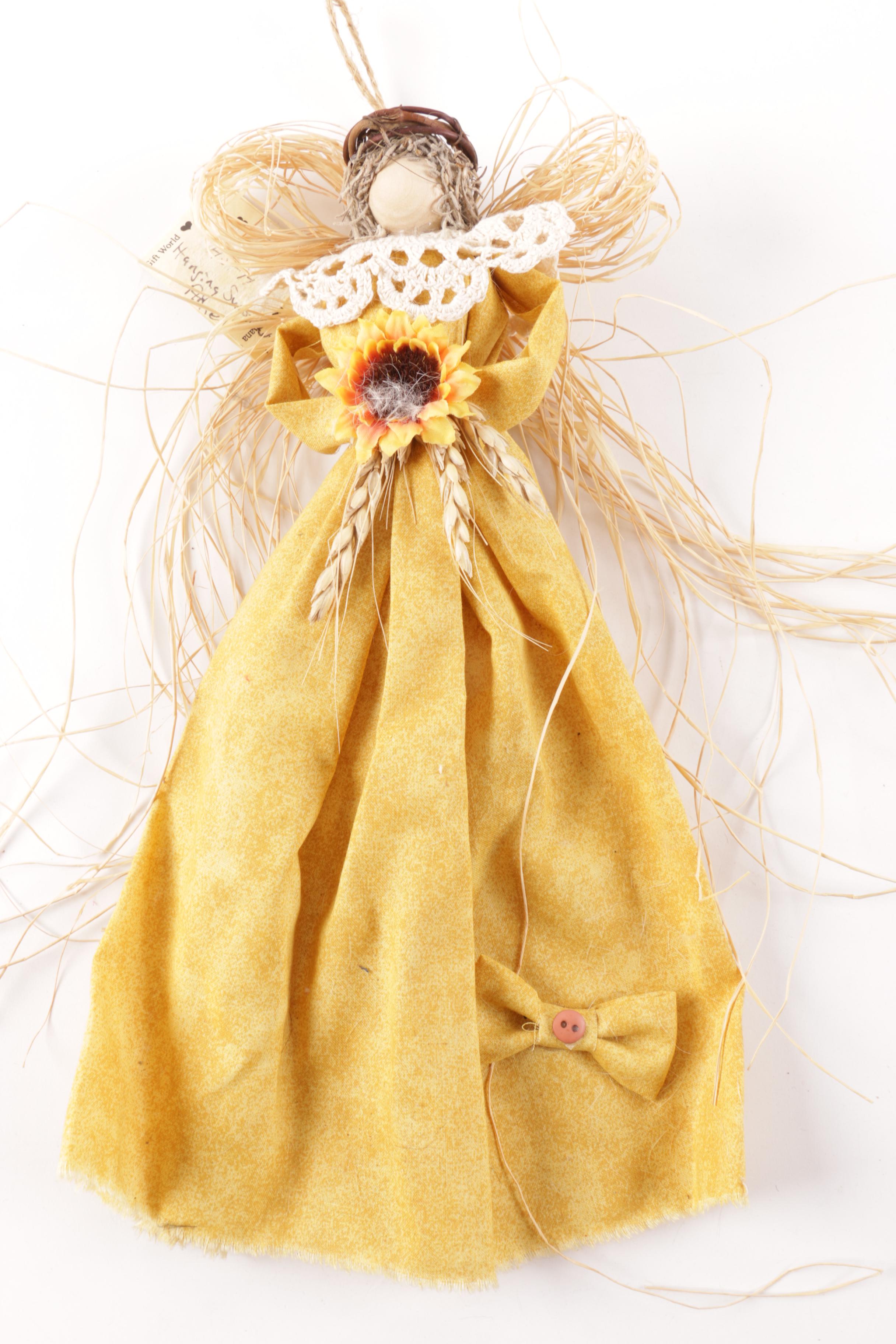 Assortment of Dolls and Figures