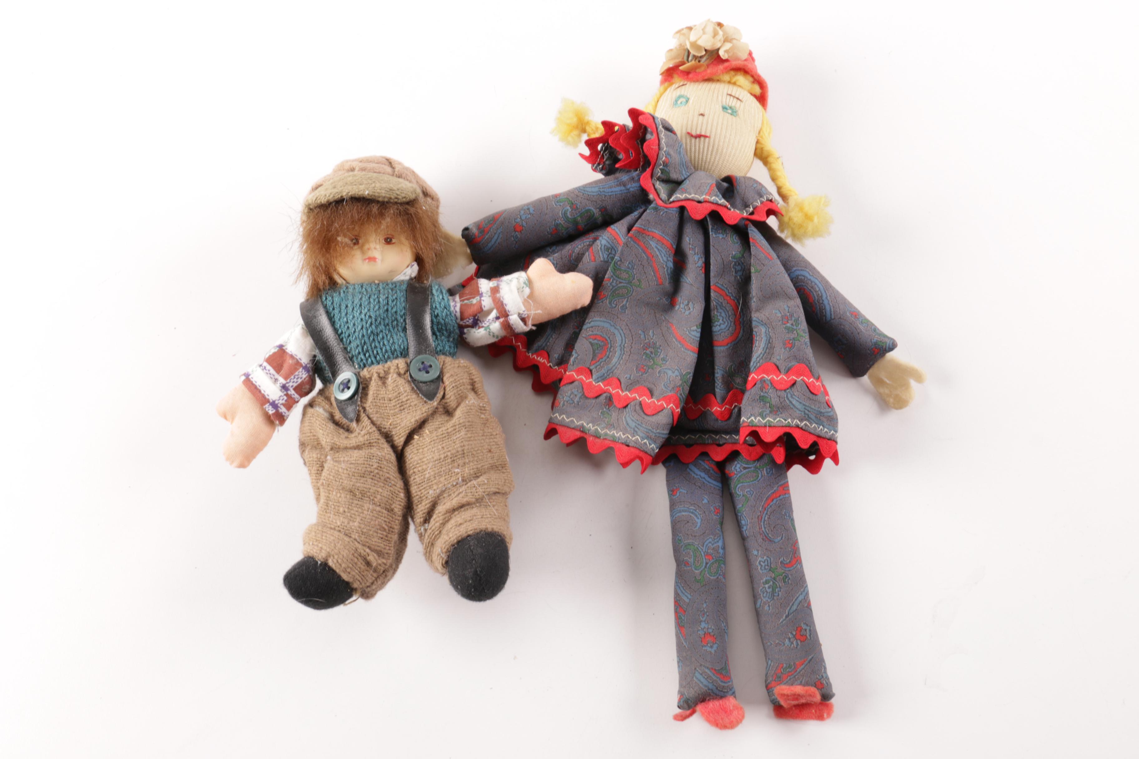 Assortment of Dolls and Figures