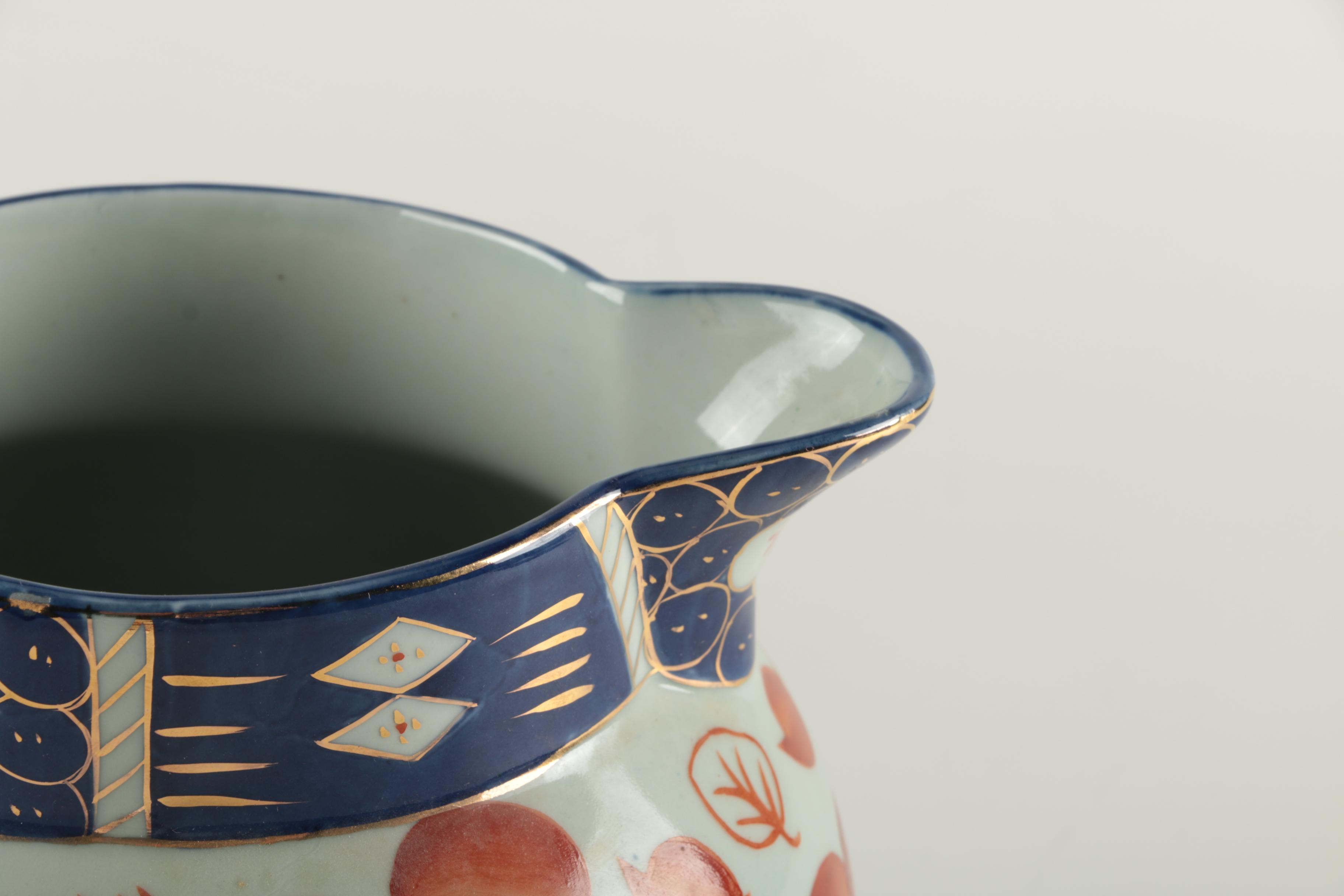 Pair of Reproduction Ironstone Pitchers