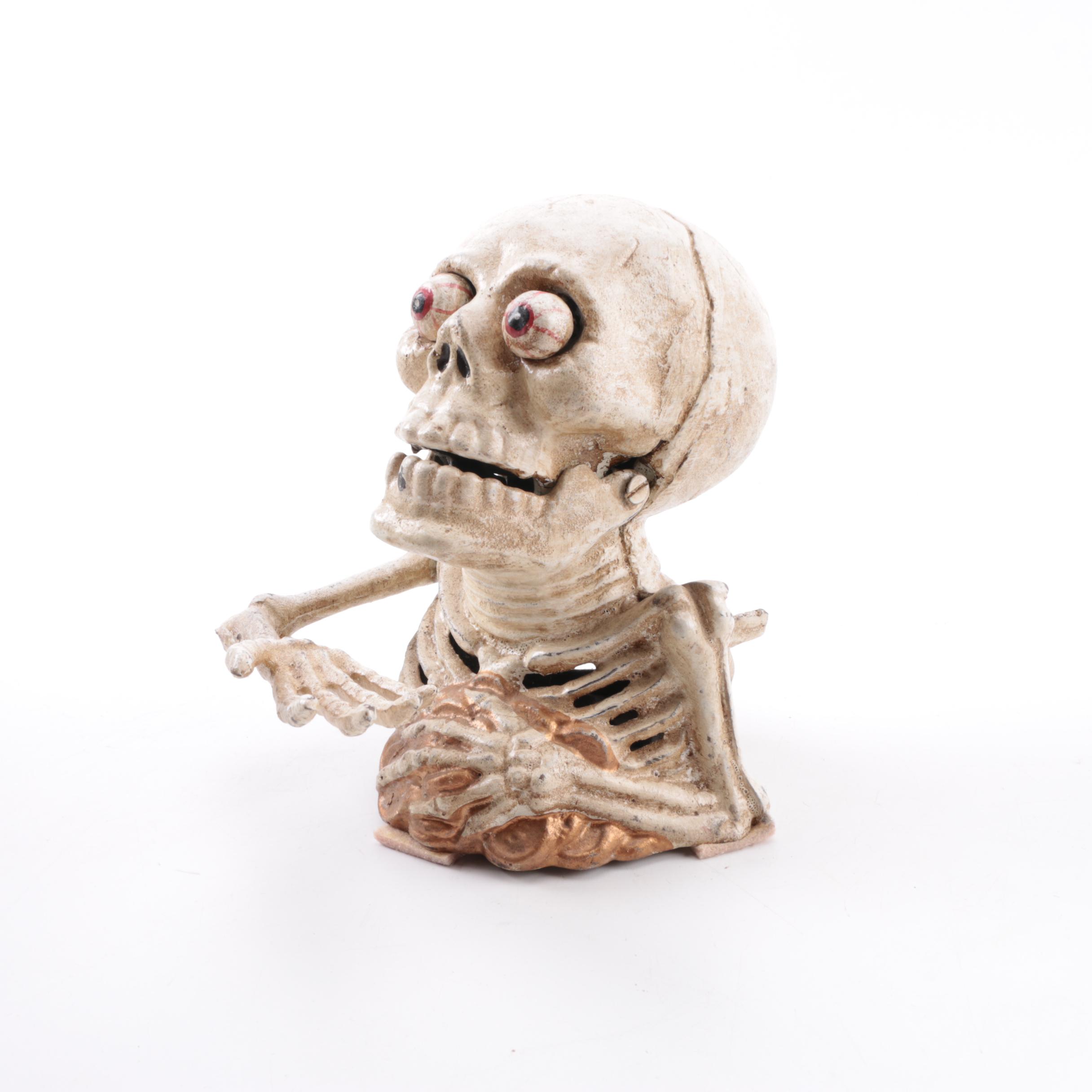 Cast Iron Skeleton Coin Bank