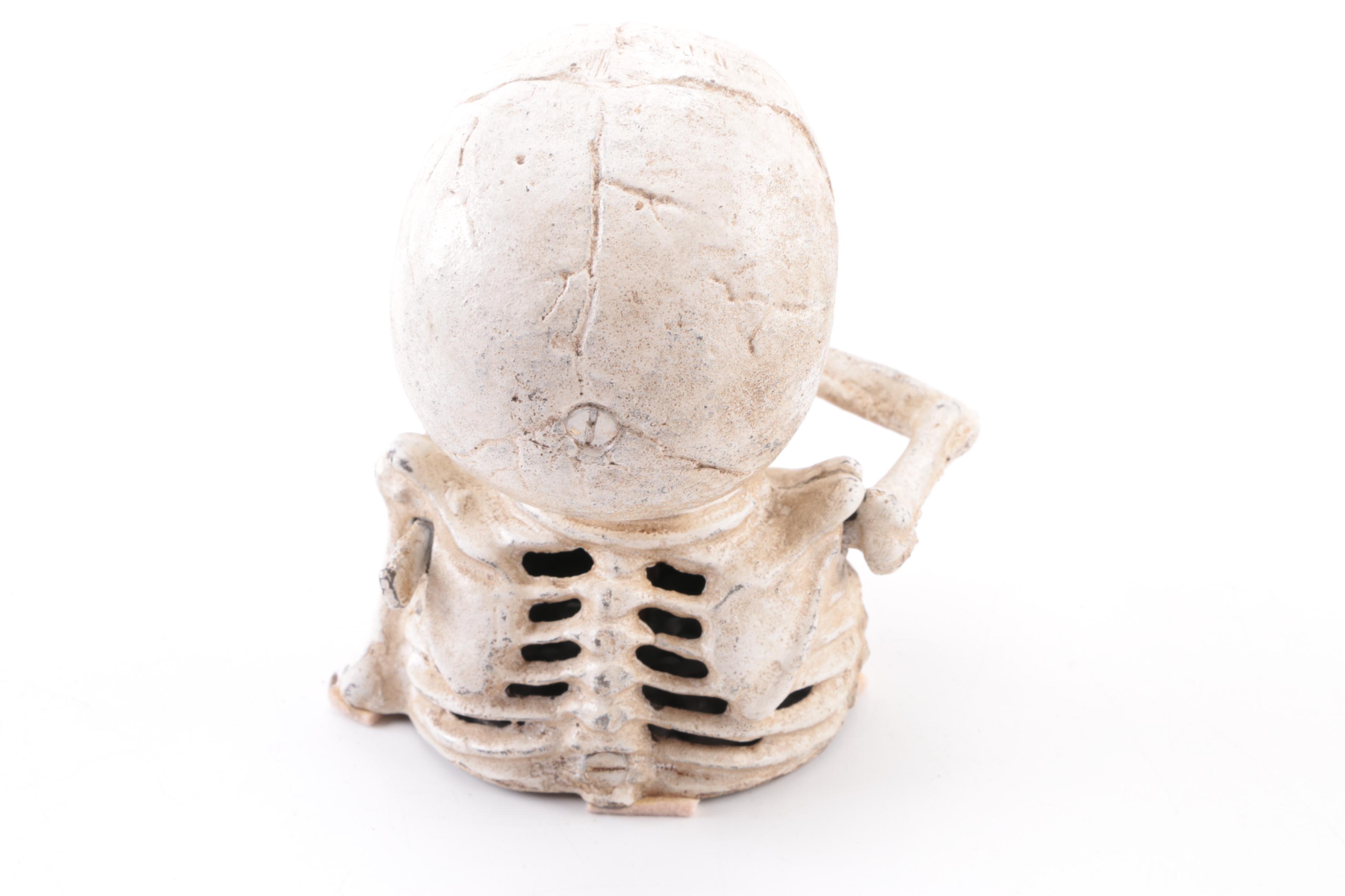 Cast Iron Skeleton Coin Bank