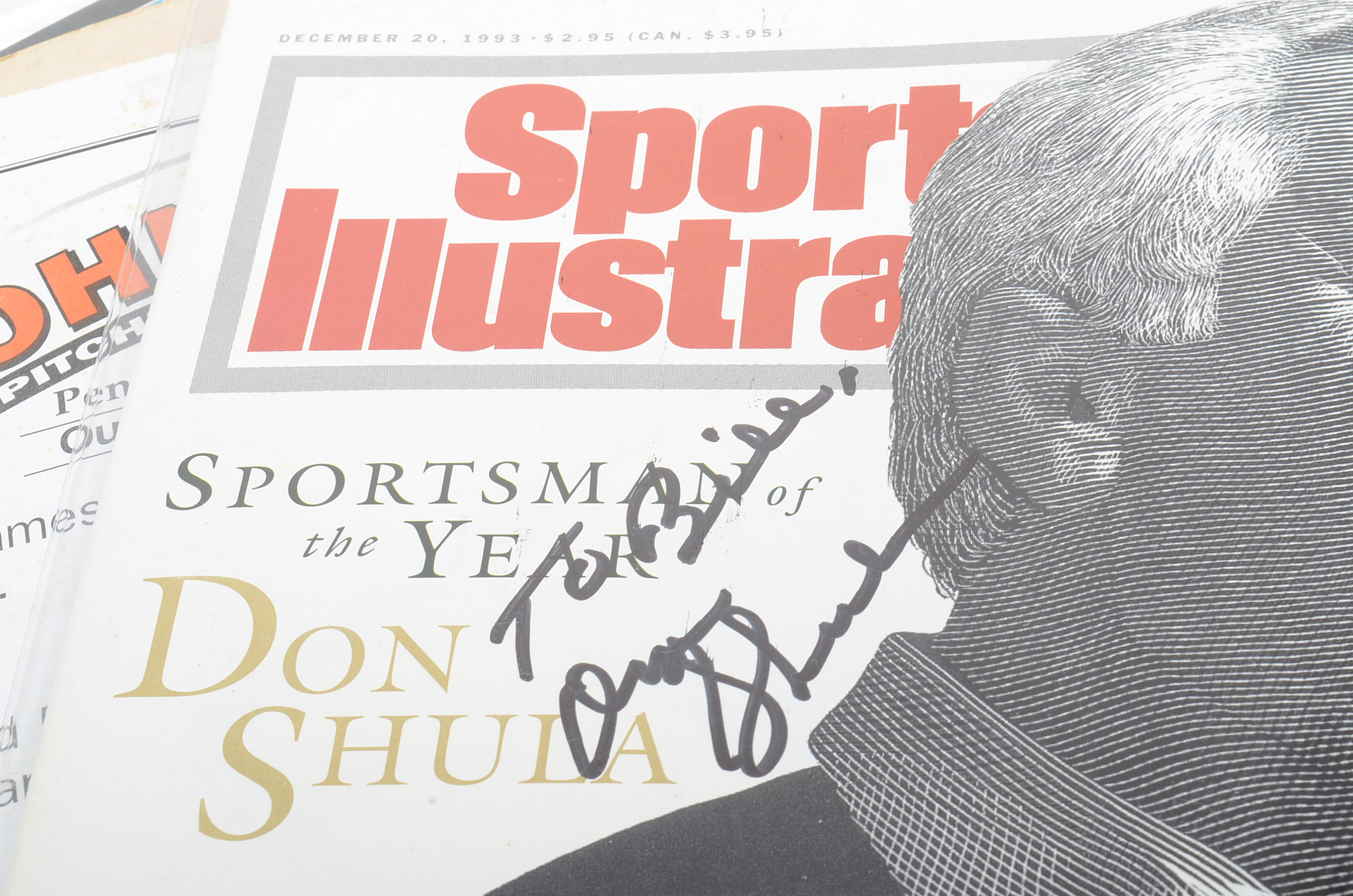 Seven Signed Sports Magazines