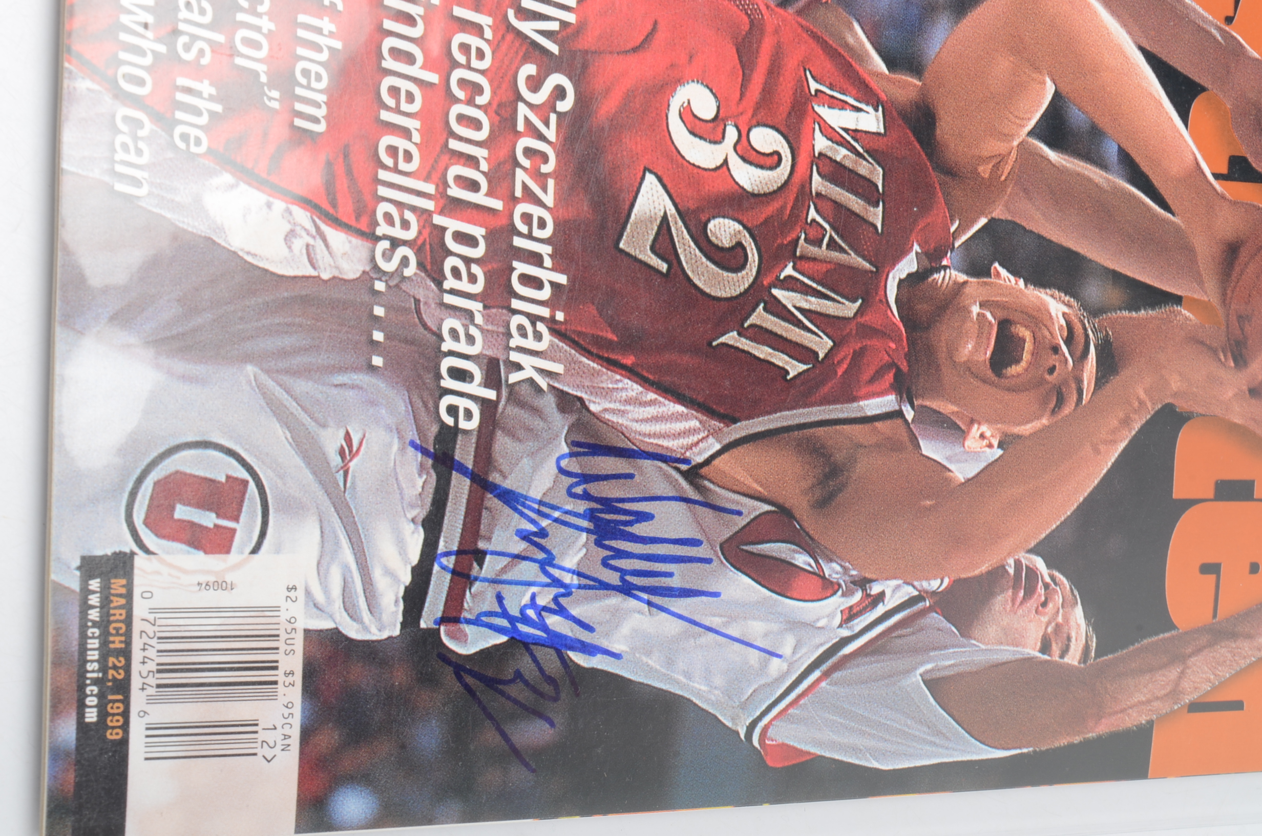 Seven Signed Sports Magazines