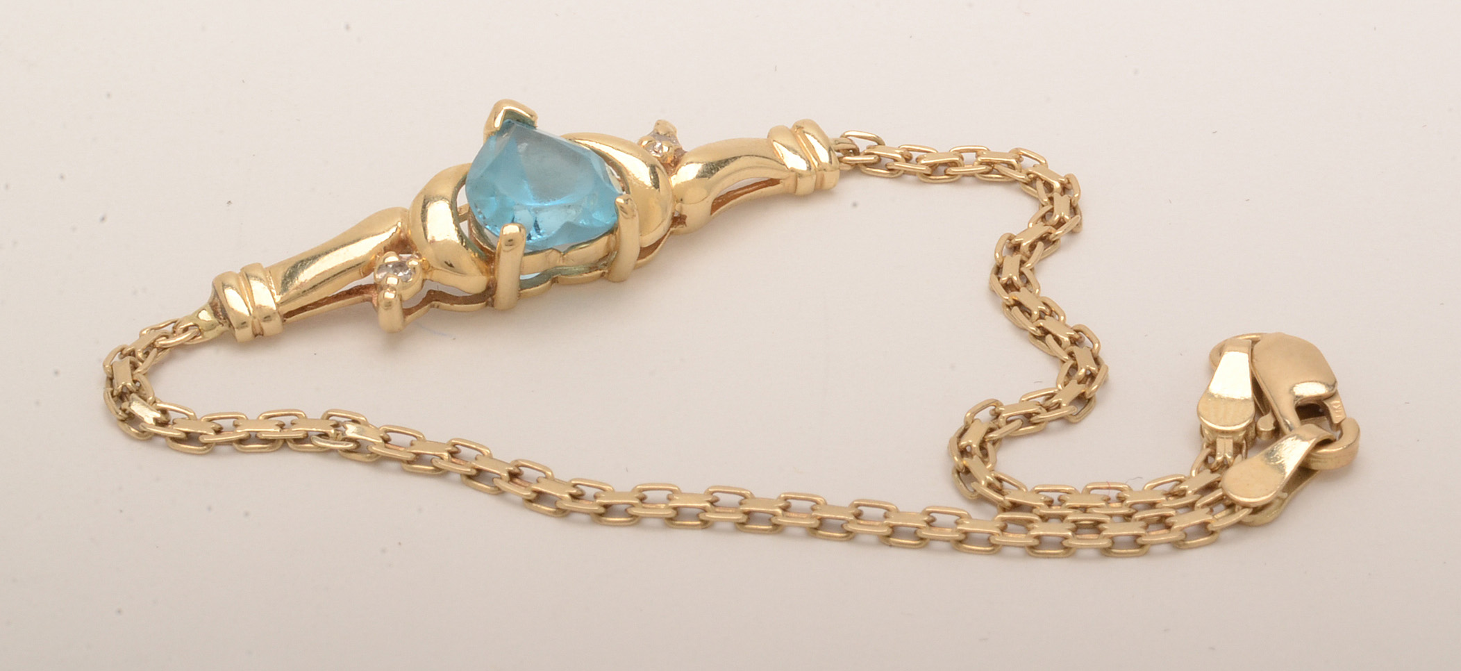 14K Yellow Gold Blue Topaz Bracelet