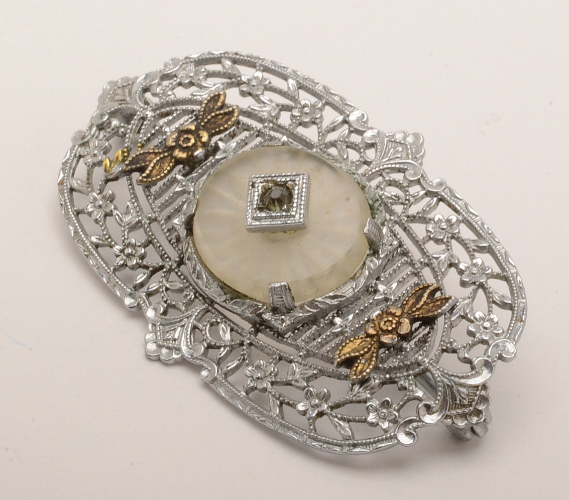 Plainville Stock Co. Openwork Camphor Glass Brooch