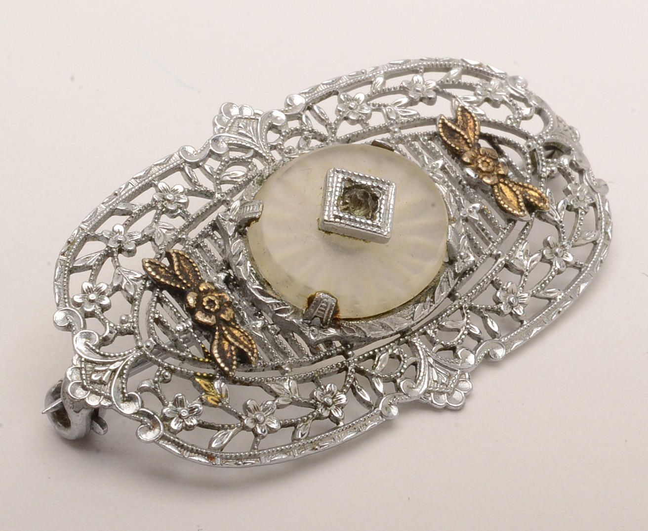 Plainville Stock Co. Openwork Camphor Glass Brooch