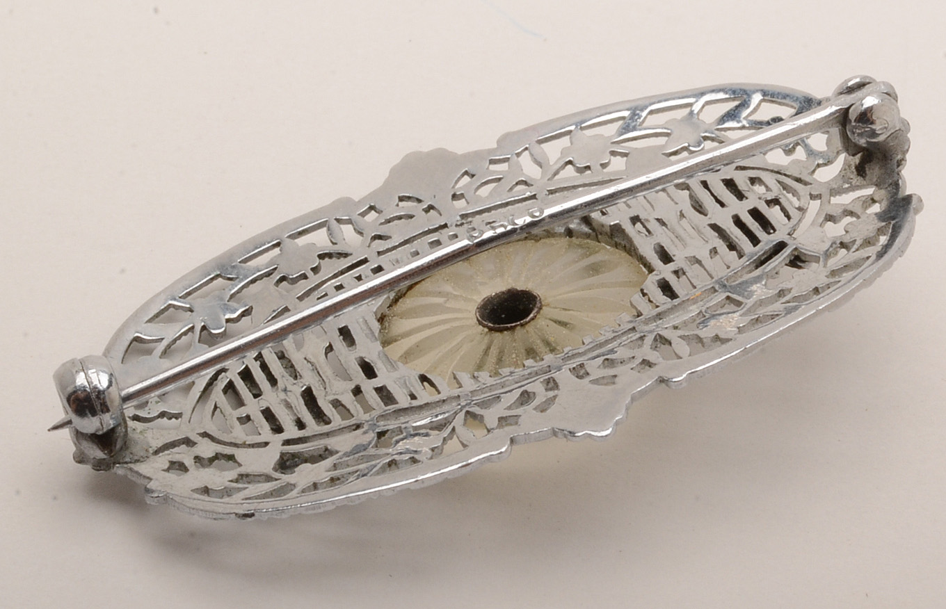 Plainville Stock Co. Openwork Camphor Glass Brooch