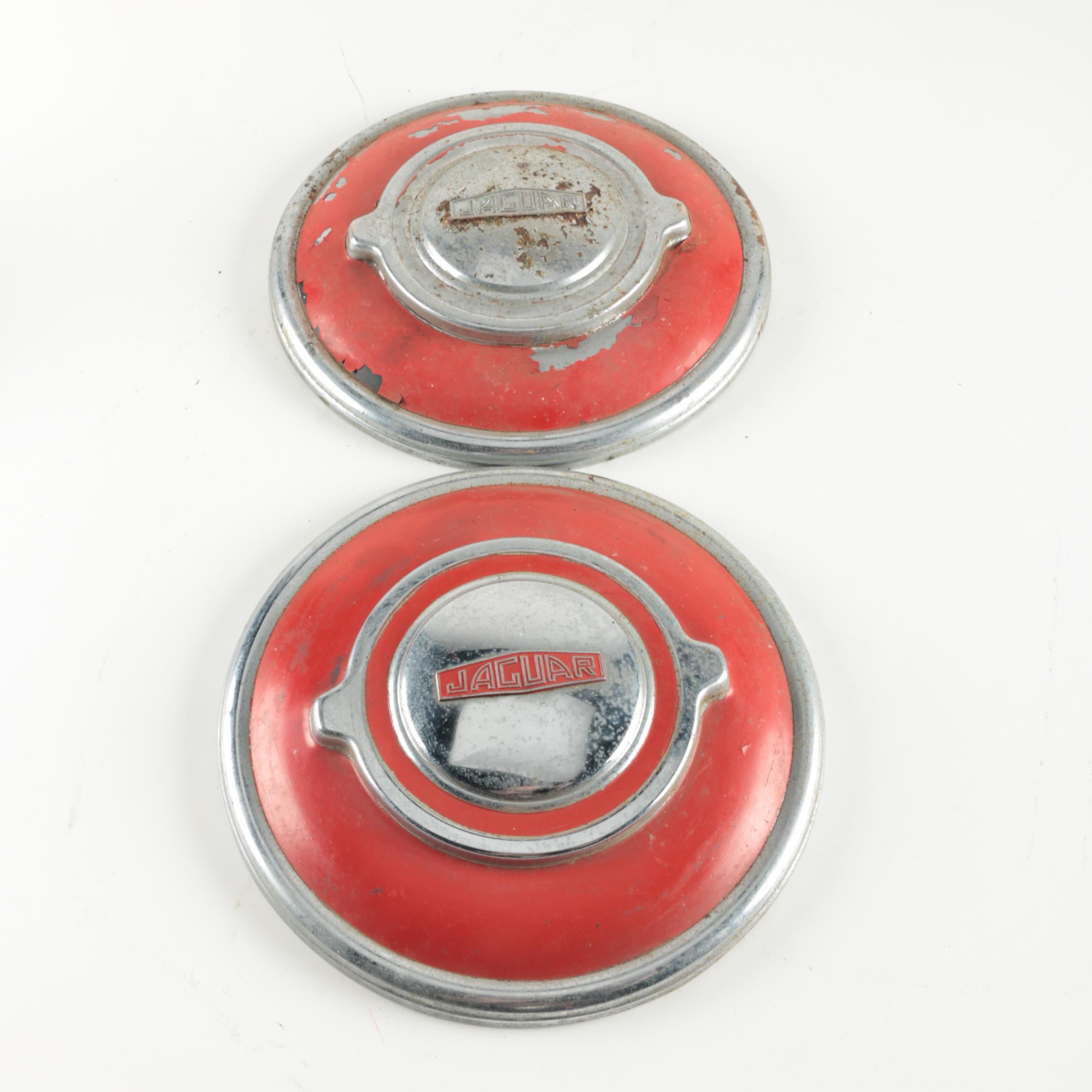 Two Red Vintage Jaguar Hubcaps
