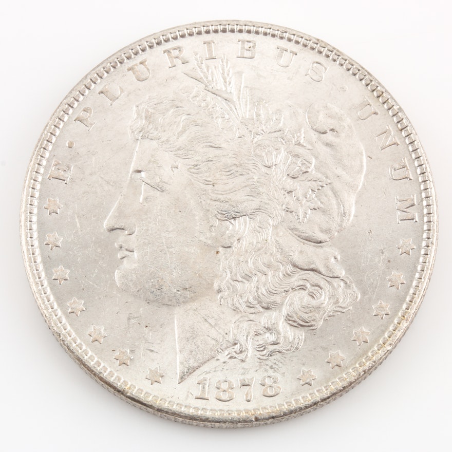 1878 7 Tail Feathers Silver Morgan Dollar