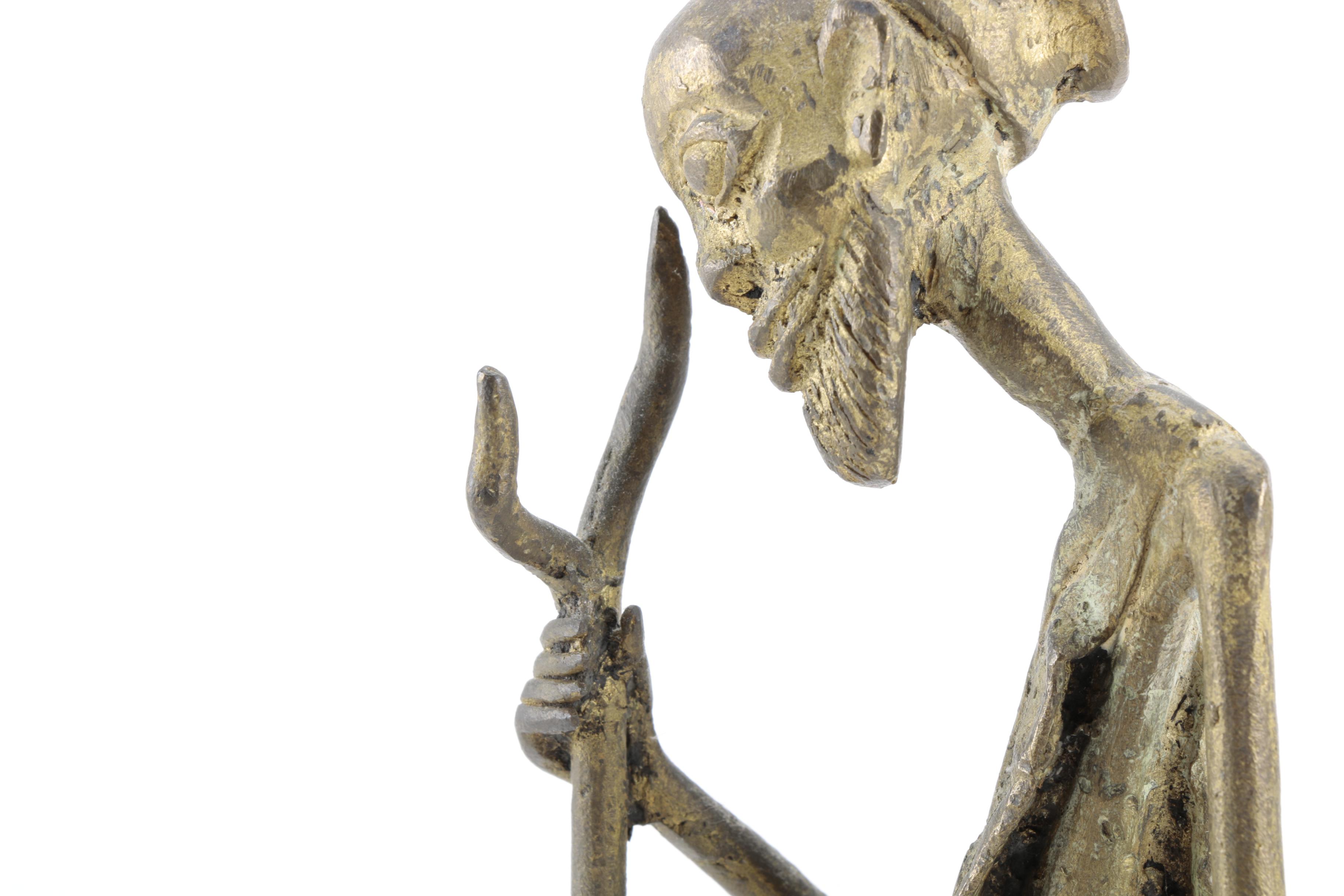 African Metal Shepherd Sculpture