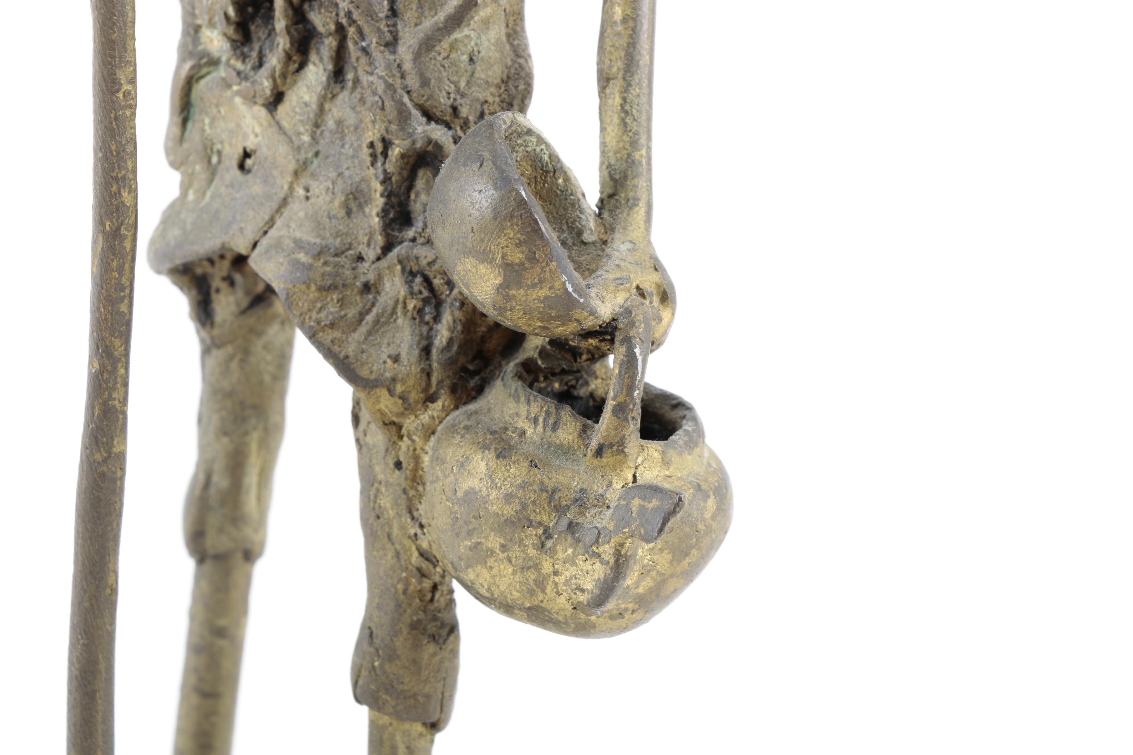 African Metal Shepherd Sculpture