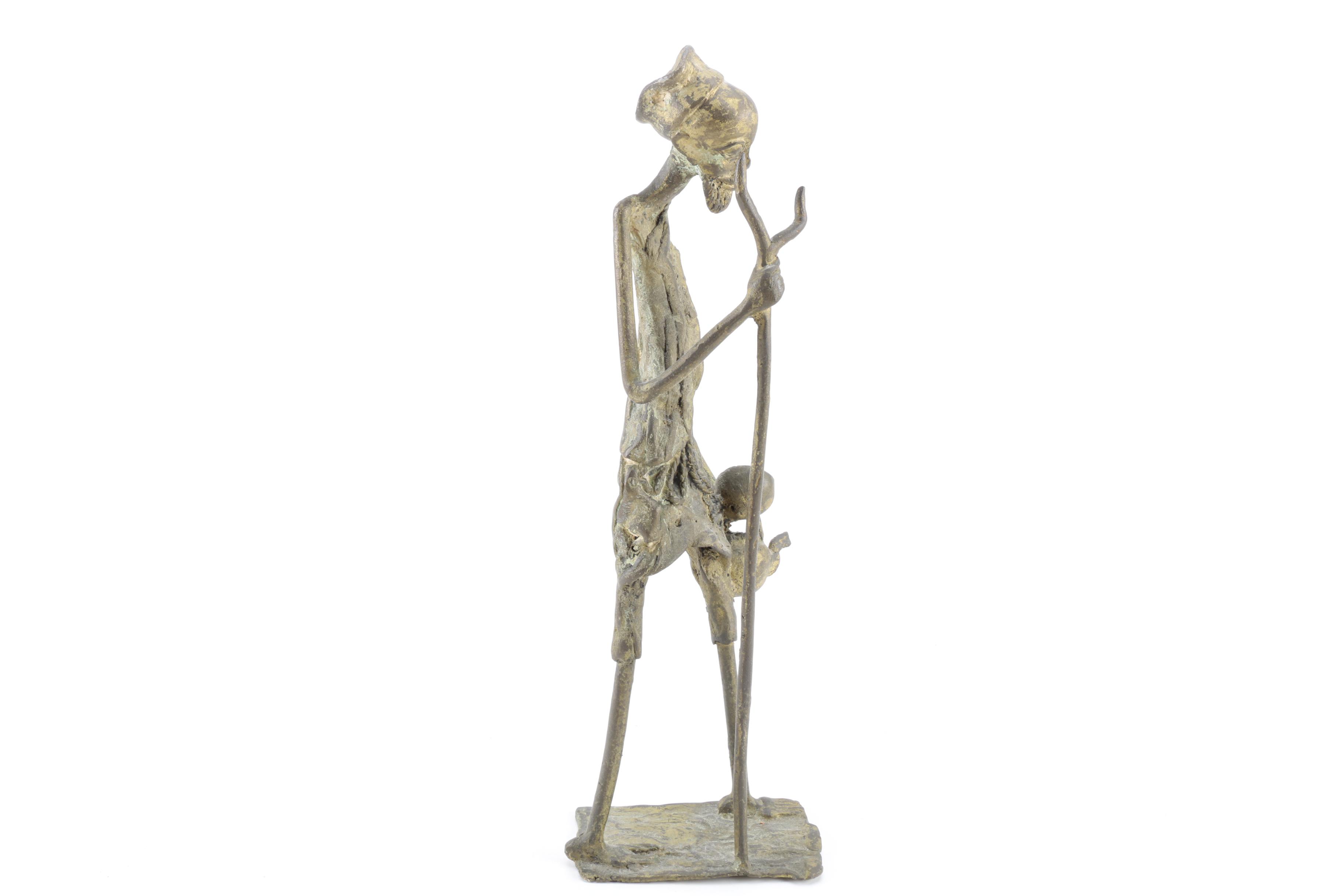 African Metal Shepherd Sculpture