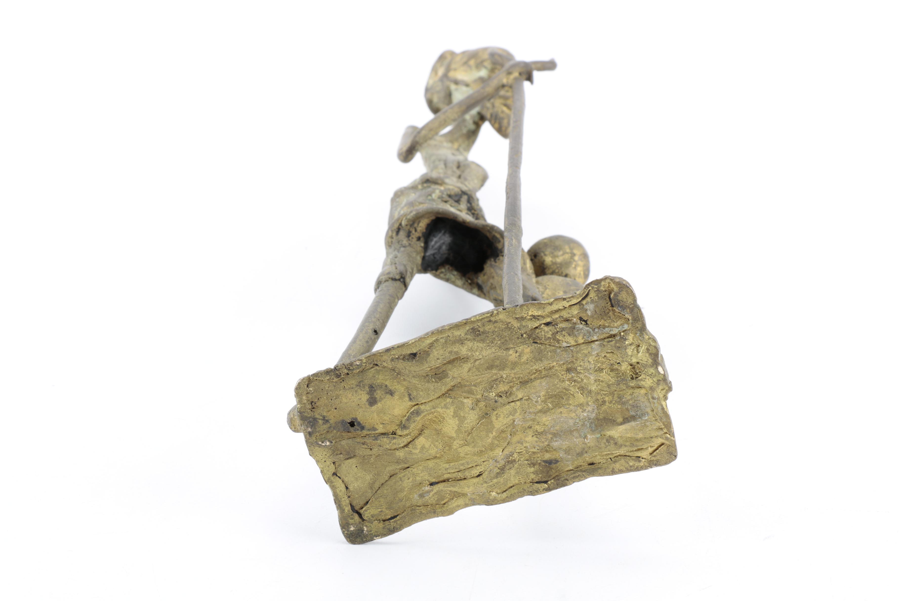 African Metal Shepherd Sculpture