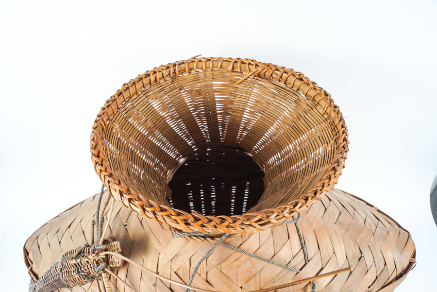 Woven Fishing Basket with Woven and Carved Fish Accents