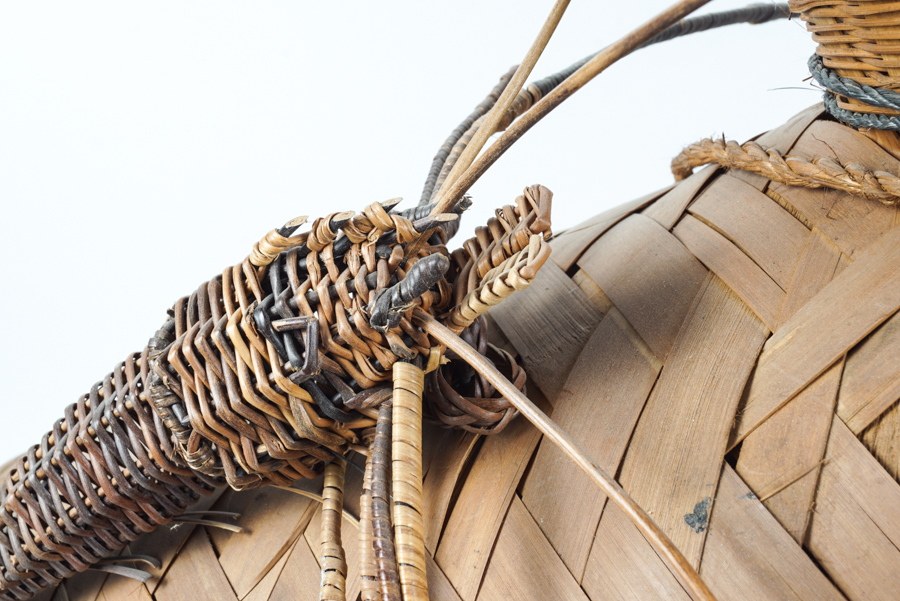 Woven Fishing Basket with Woven and Carved Fish Accents