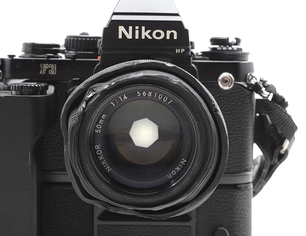 Two Vintage Nikon 35MM Film Cameras And Accessories