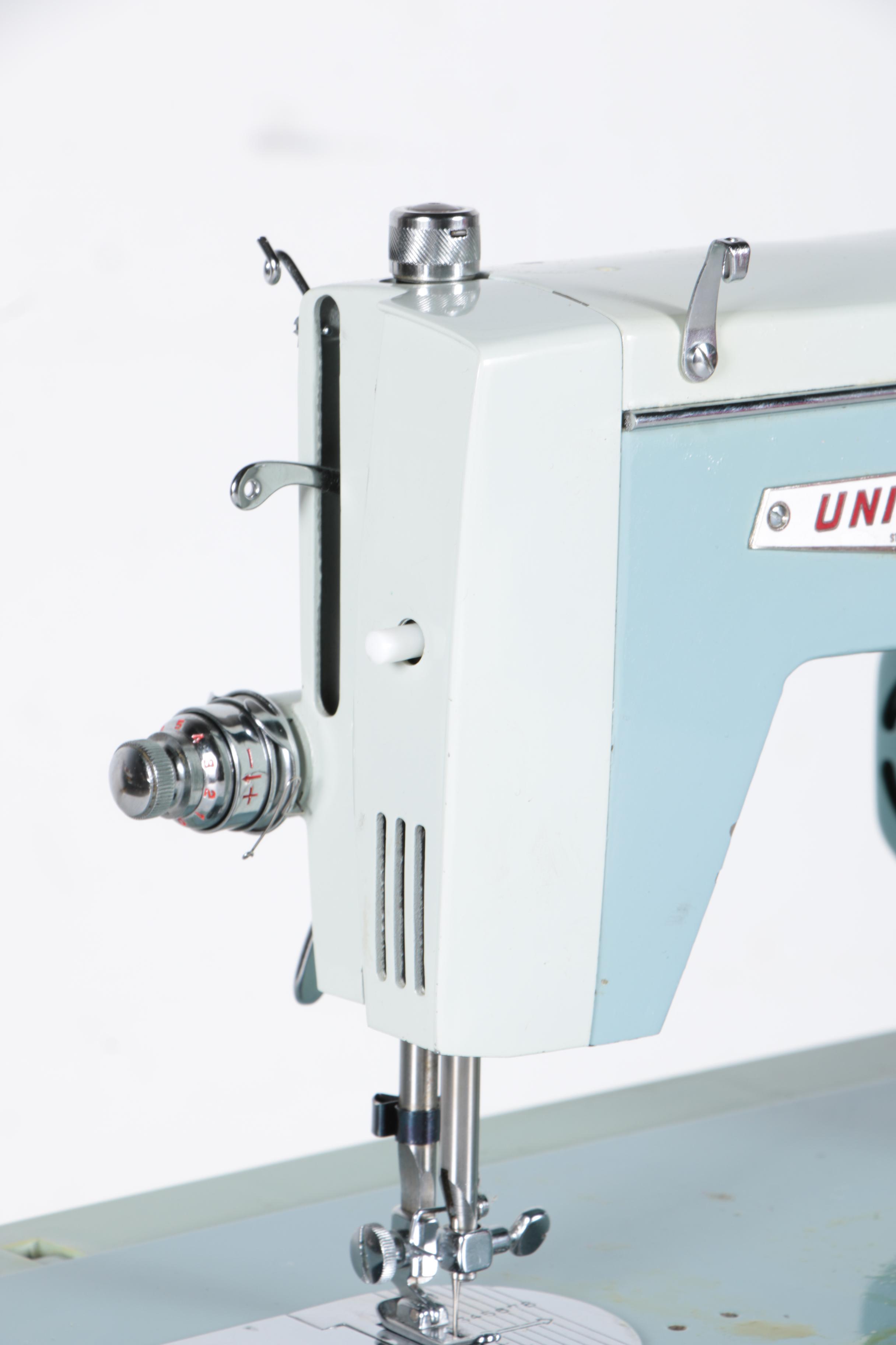 Vintage Universal Brand Sewing Machine with Case