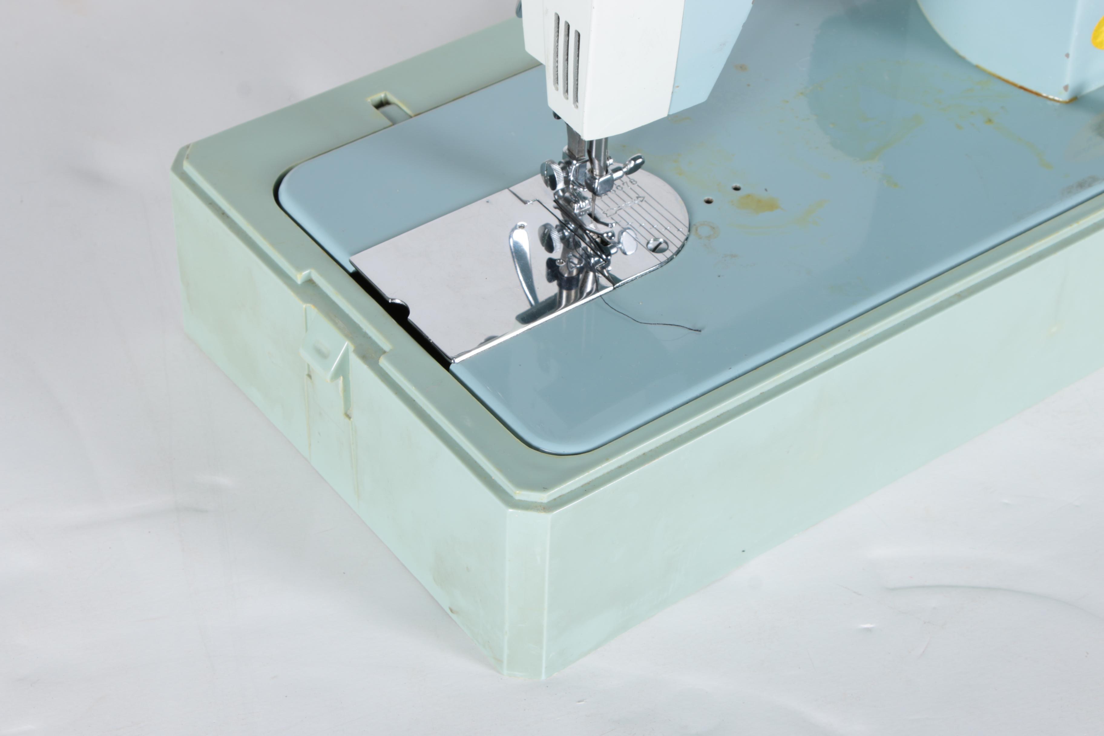 Vintage Universal Brand Sewing Machine with Case
