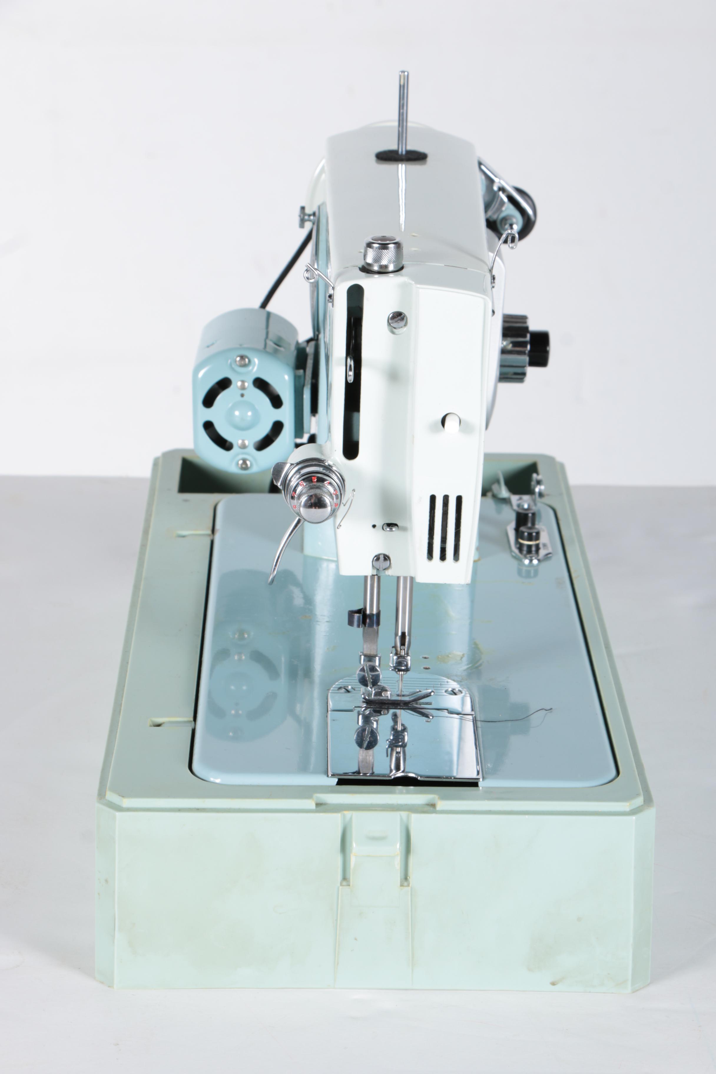 Vintage Universal Brand Sewing Machine with Case