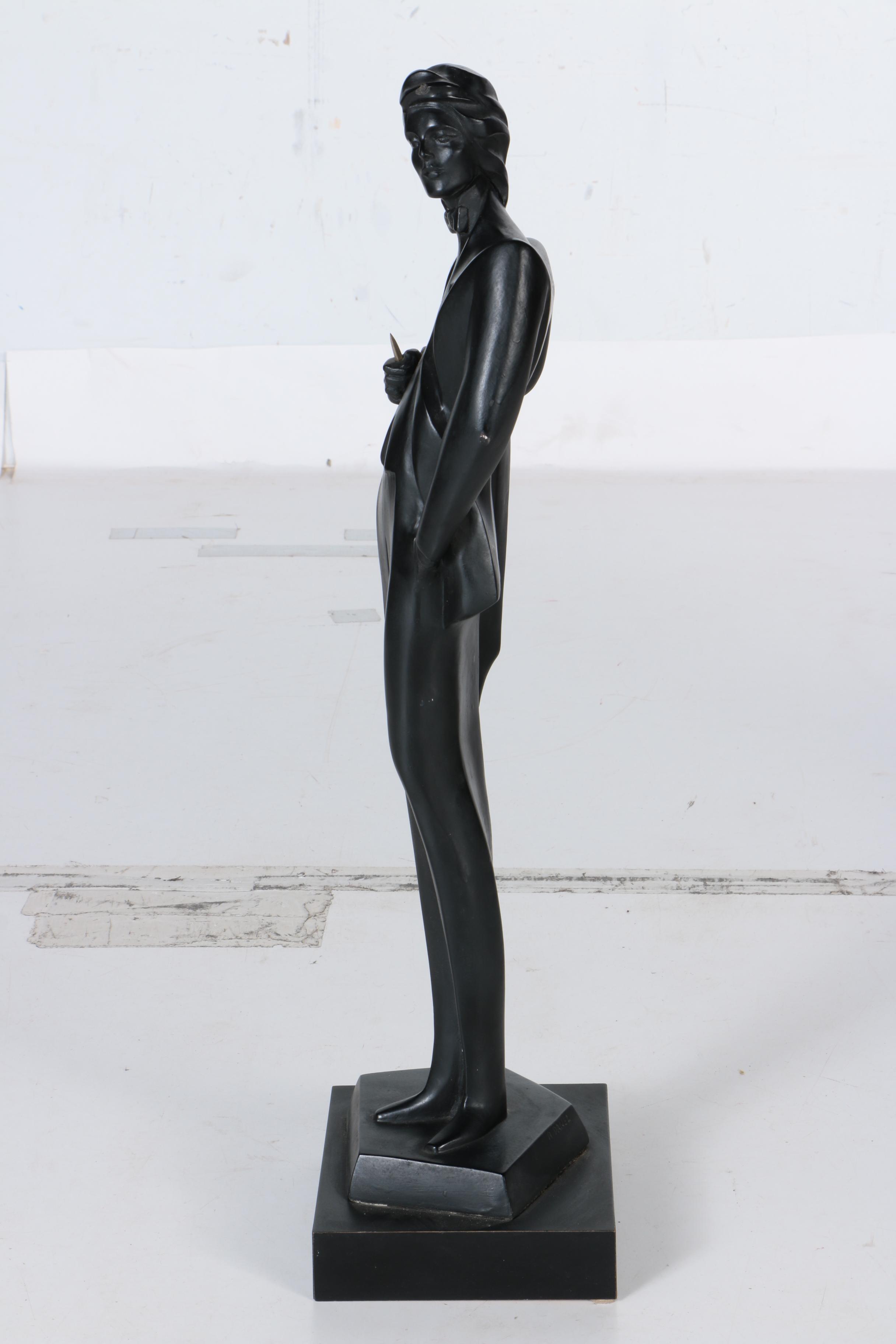 Pair of Neo Deco Man and Woman Ceramic Figurines