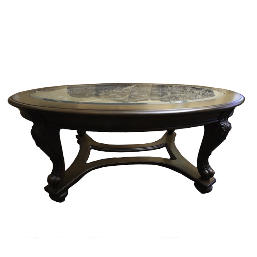 Oval Coffee Table with Decorative Scrolled Metal Panel